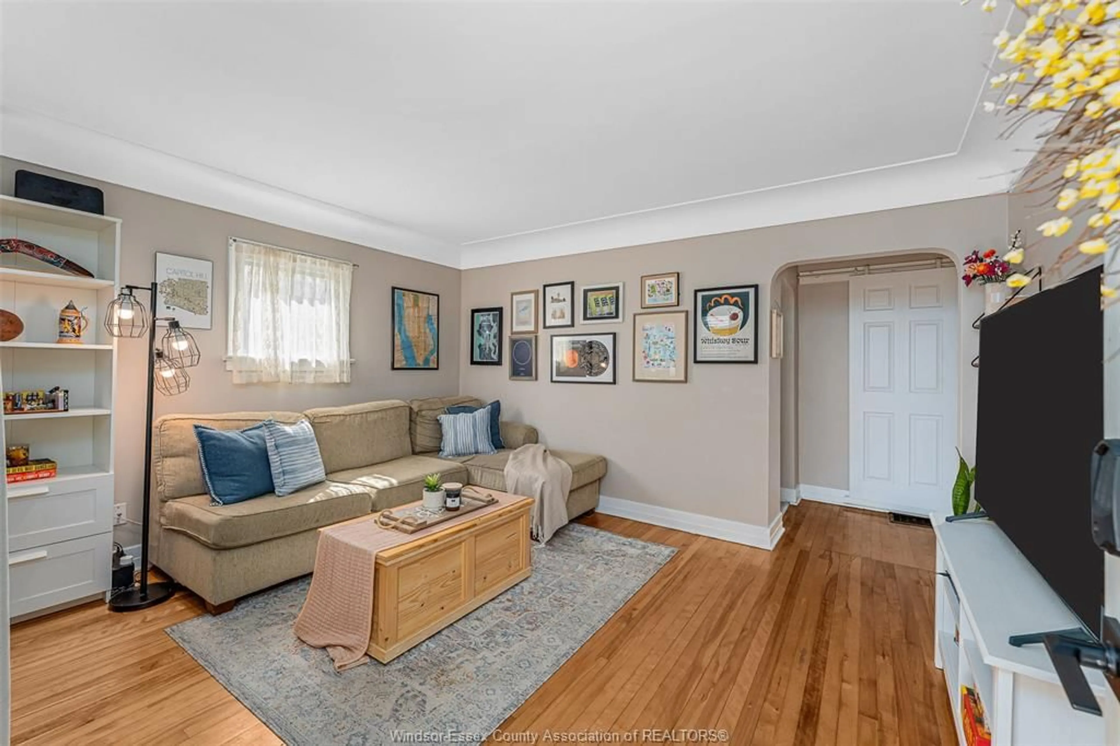 Living room with furniture, wood/laminate floor for 2429 TOURANGEAU, Windsor Ontario N8W 4N8