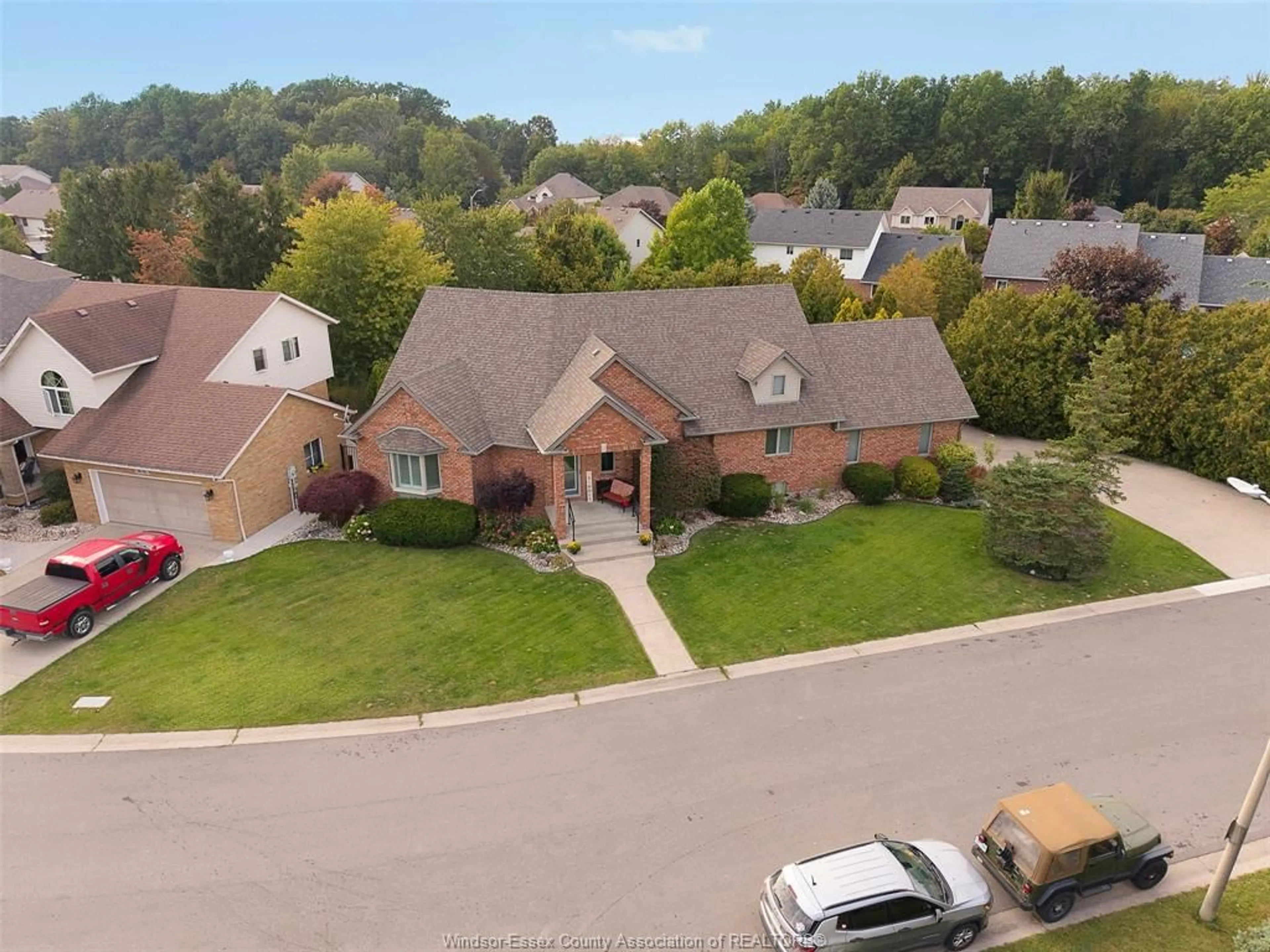 A pic from outside/outdoor area/front of a property/back of a property/a pic from drone, mountain view for 16 MEADOW LANE, Essex Ontario N8M 3C5