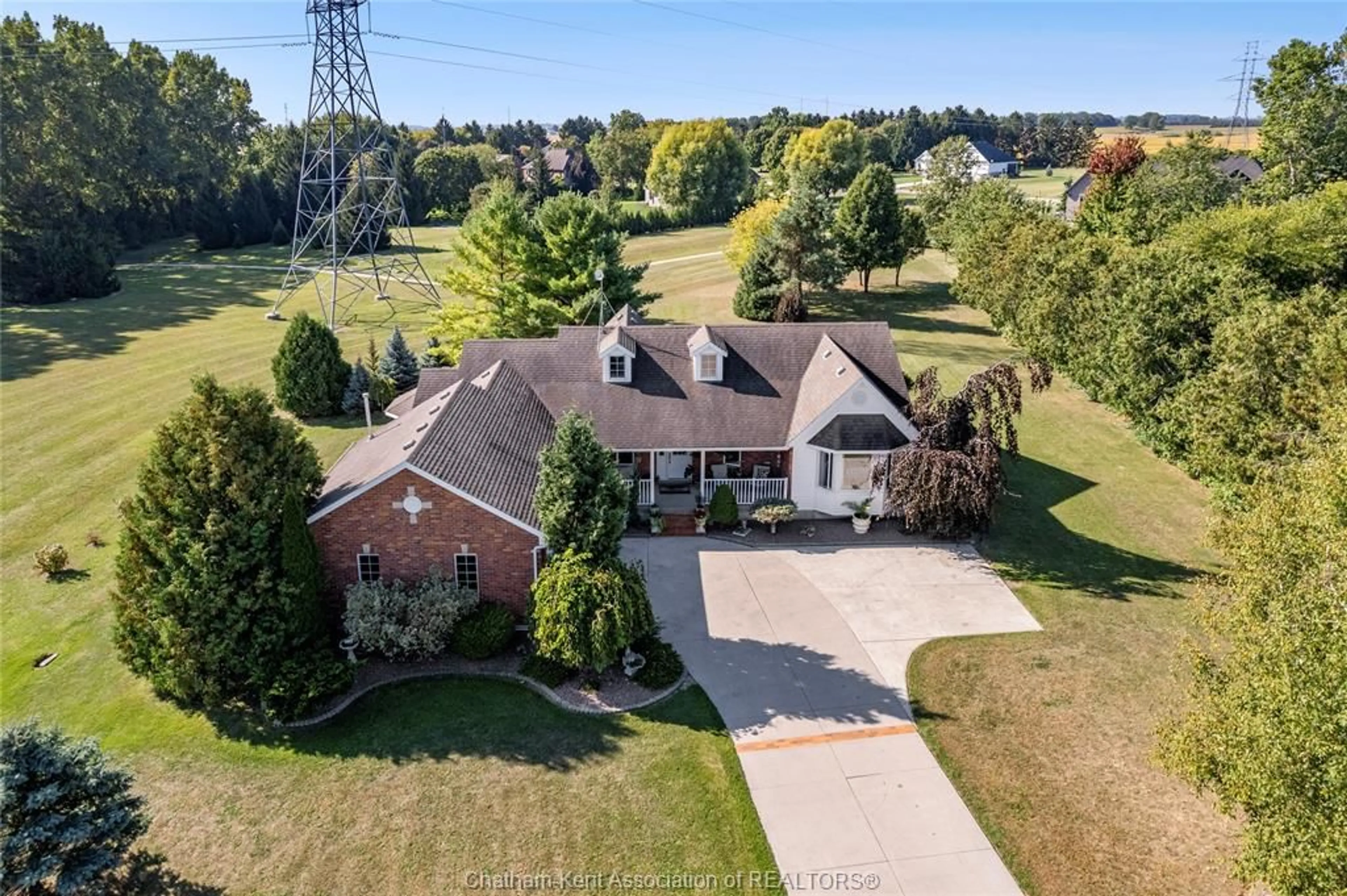 A pic from outside/outdoor area/front of a property/back of a property/a pic from drone, unknown for 21640 Pinehurst Cres, Chatham-Kent Ontario N7M 5J3