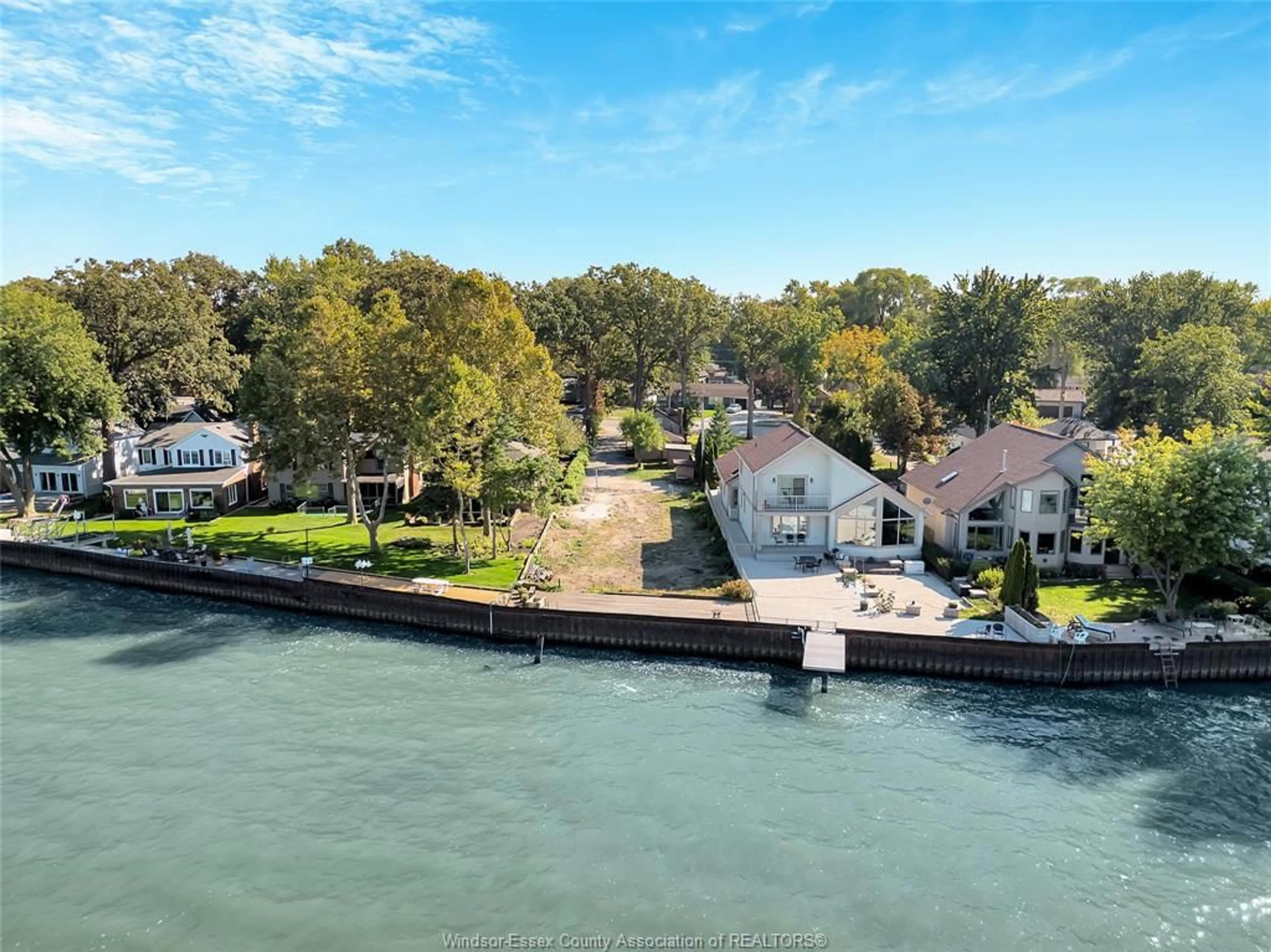 A pic from outside/outdoor area/front of a property/back of a property/a pic from drone, water/lake/river/ocean view for 12718-12722 RIVERSIDE Dr, Tecumseh Ontario N8N 1A7