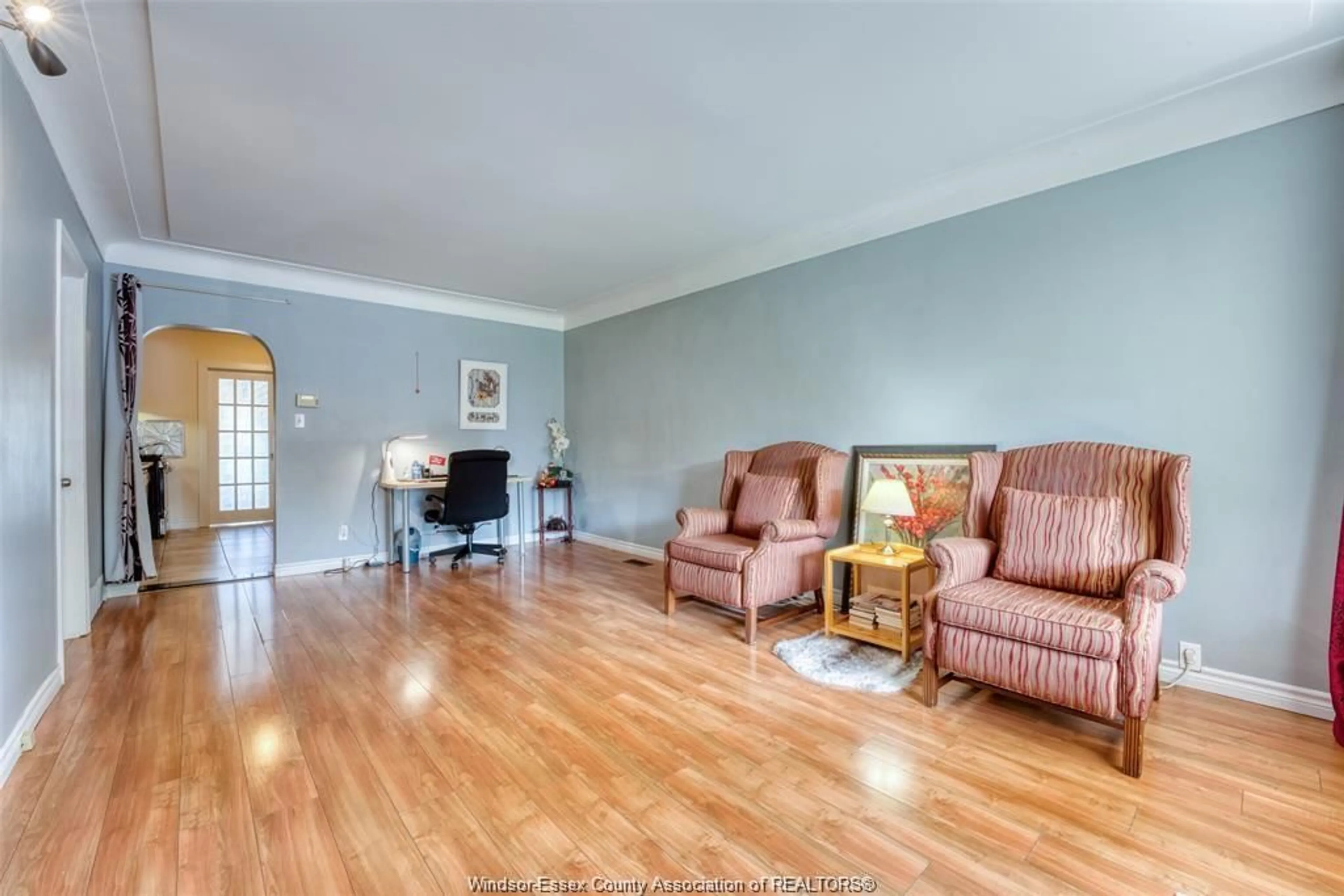 Living room with furniture, wood/laminate floor for 1794 GLADSTONE Ave, Windsor Ontario N8W 2N3