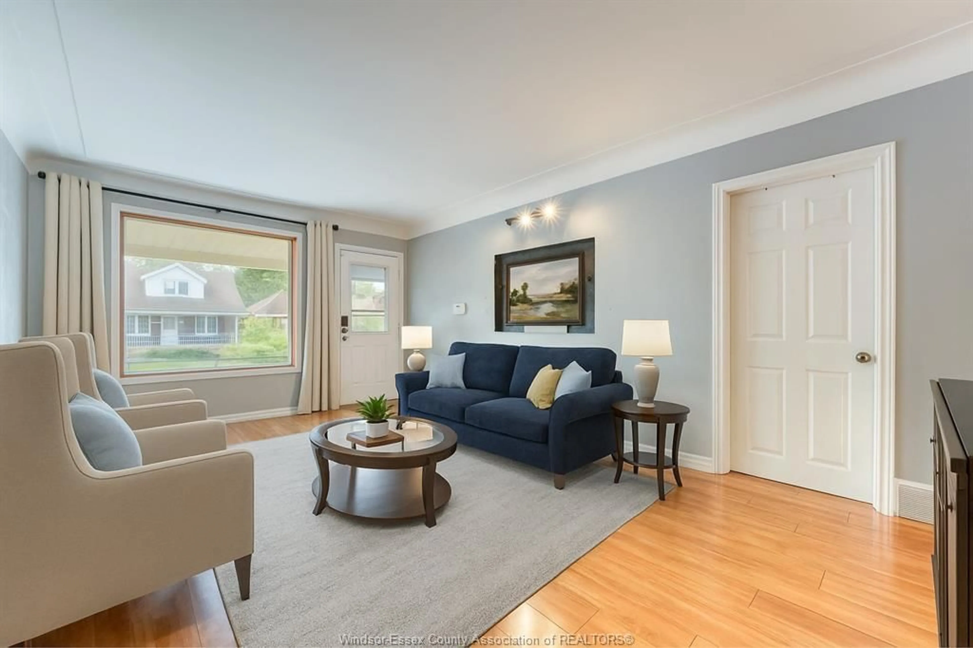 Living room with furniture, wood/laminate floor for 1794 GLADSTONE Ave, Windsor Ontario N8W 2N3