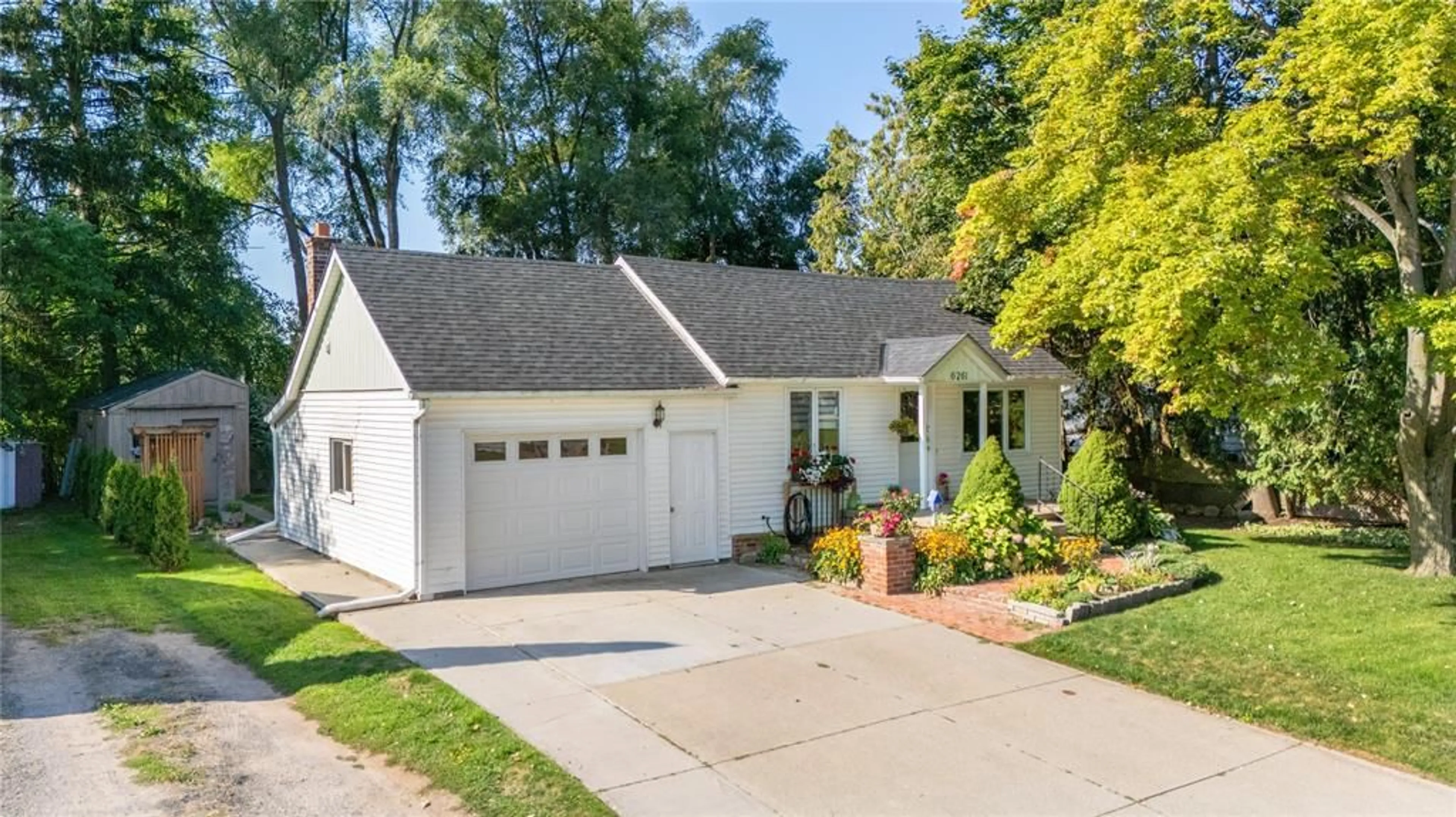 Home with brick exterior material, street for 6261 TOWNSEND Line, Lambton Shores Ontario N0N 1J0