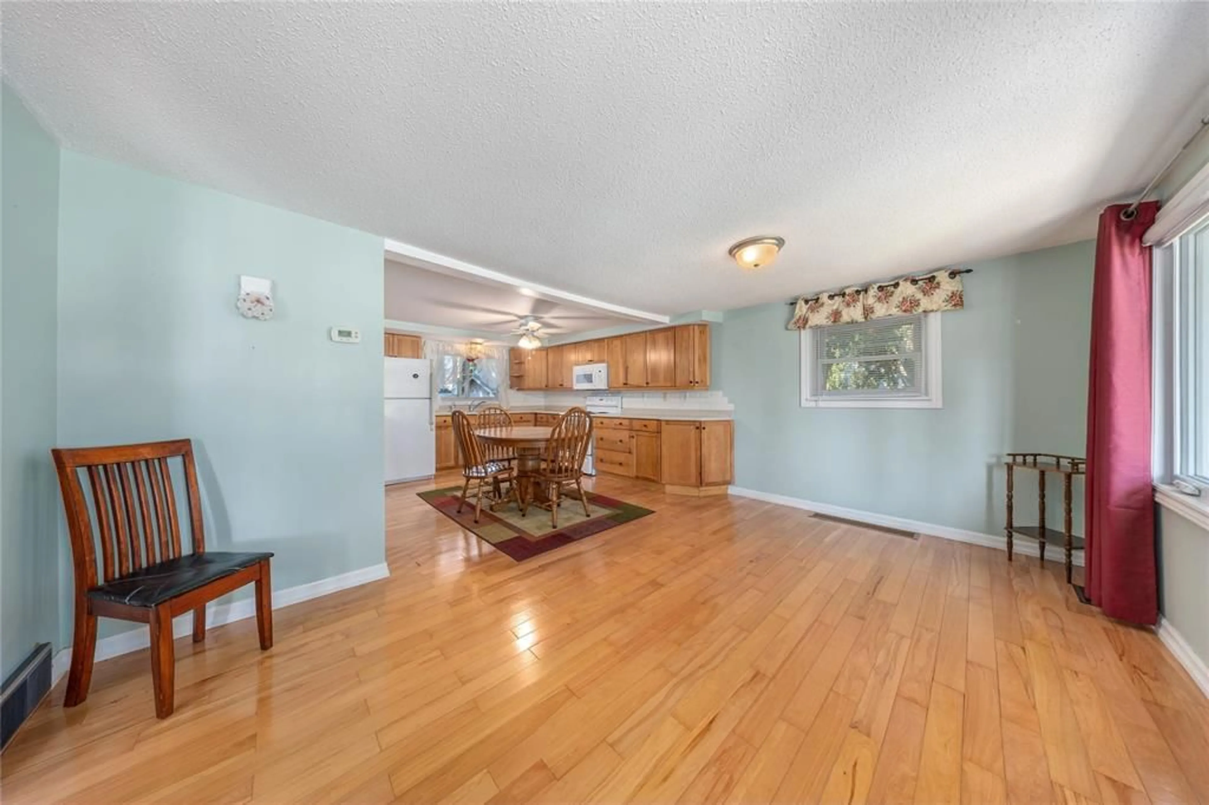 Open concept kitchen, wood/laminate floor for 6261 TOWNSEND Line, Lambton Shores Ontario N0N 1J0