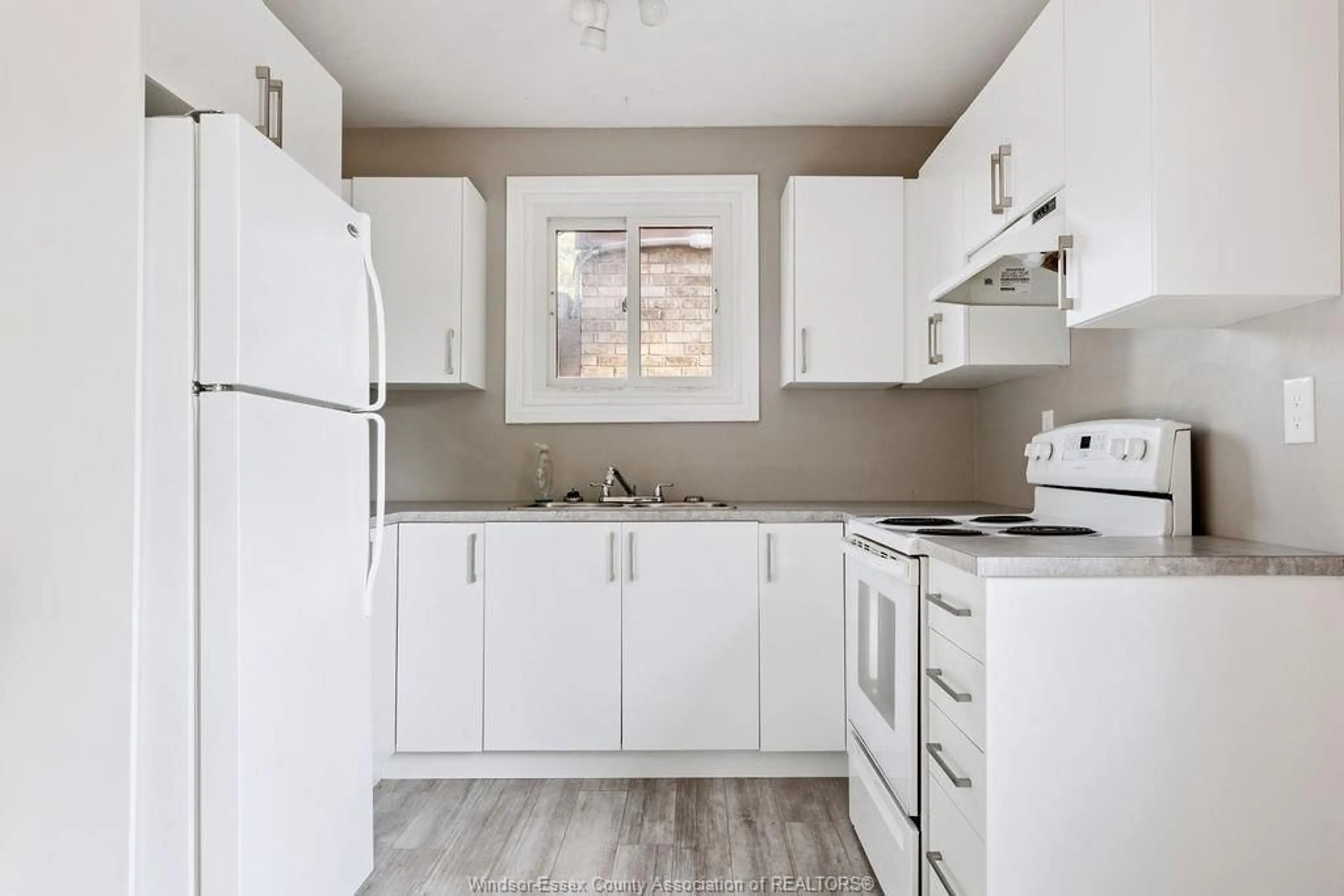 Standard kitchen, wood/laminate floor for 1126 AIRE Pl, Windsor Ontario N8S 4G2