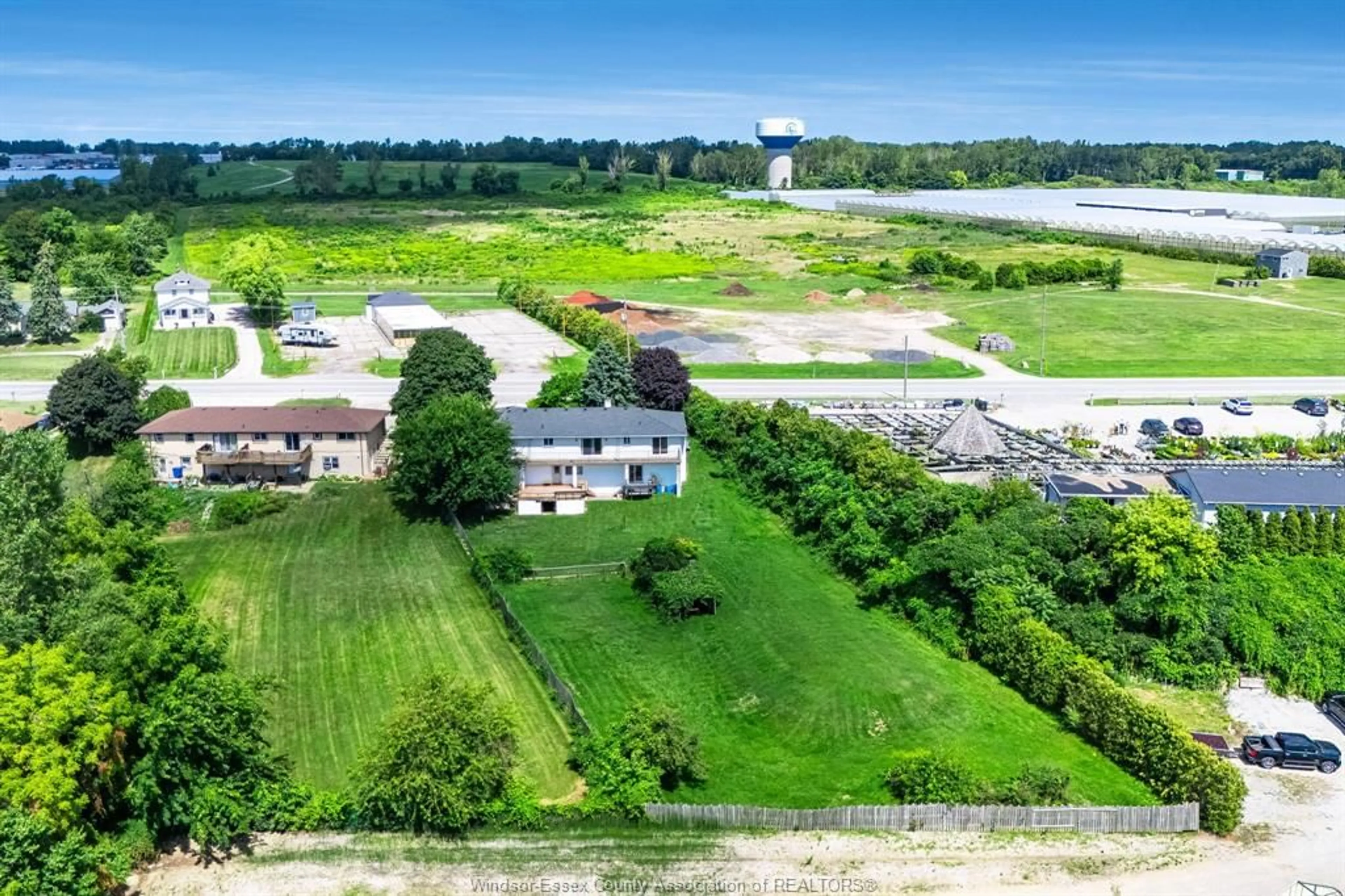 A pic from outside/outdoor area/front of a property/back of a property/a pic from drone, water/lake/river/ocean view for 2017 Talbot Rd, Kingsville Ontario N9Y 2E4