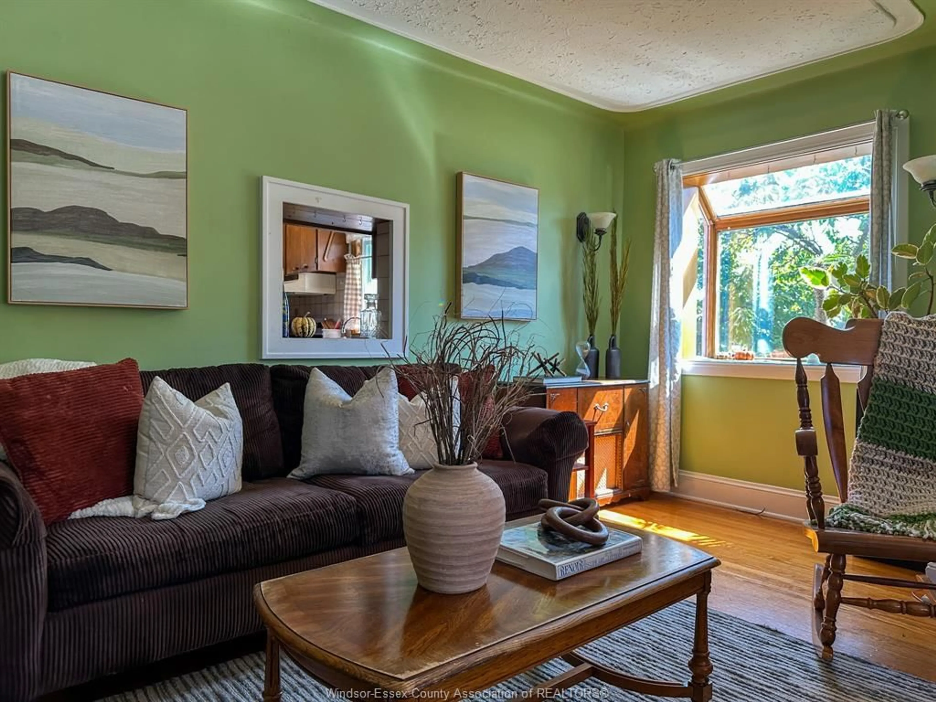 Living room with furniture, wood/laminate floor for 2348 BERNARD, Windsor Ontario N8W 4R8