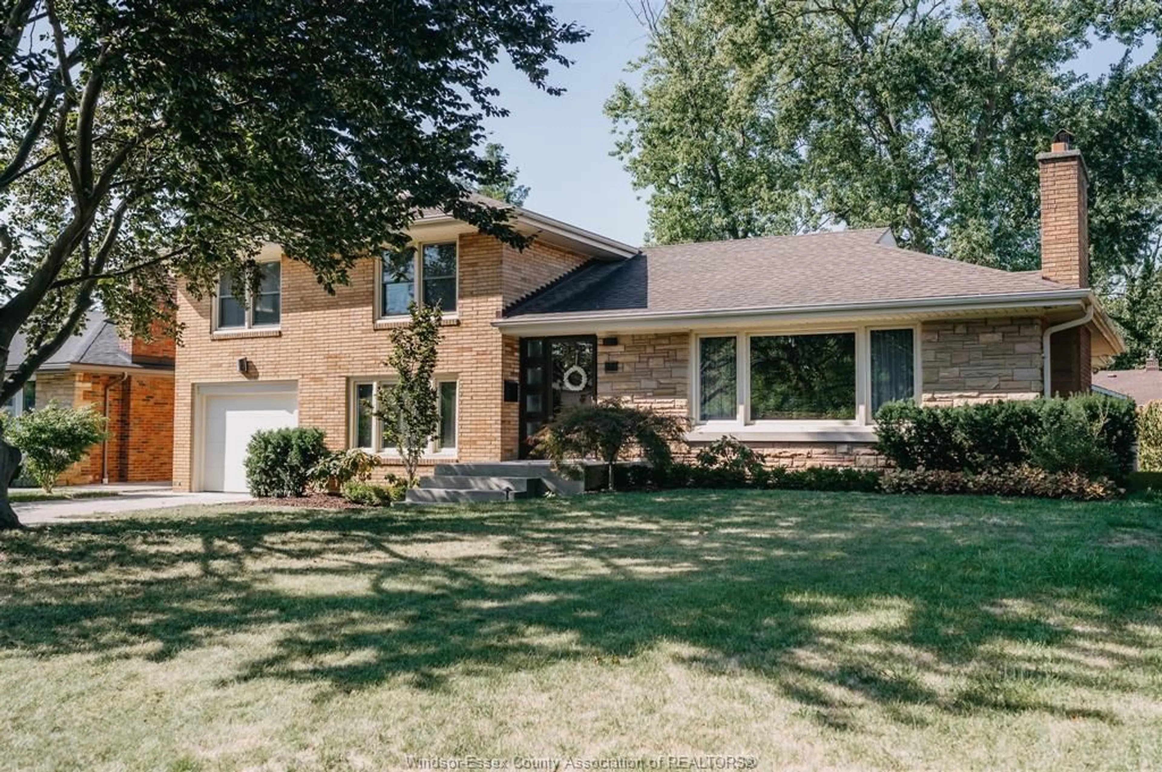 Home with brick exterior material, street for 279 Eastlawn Ave, Windsor Ontario N8S 3H1