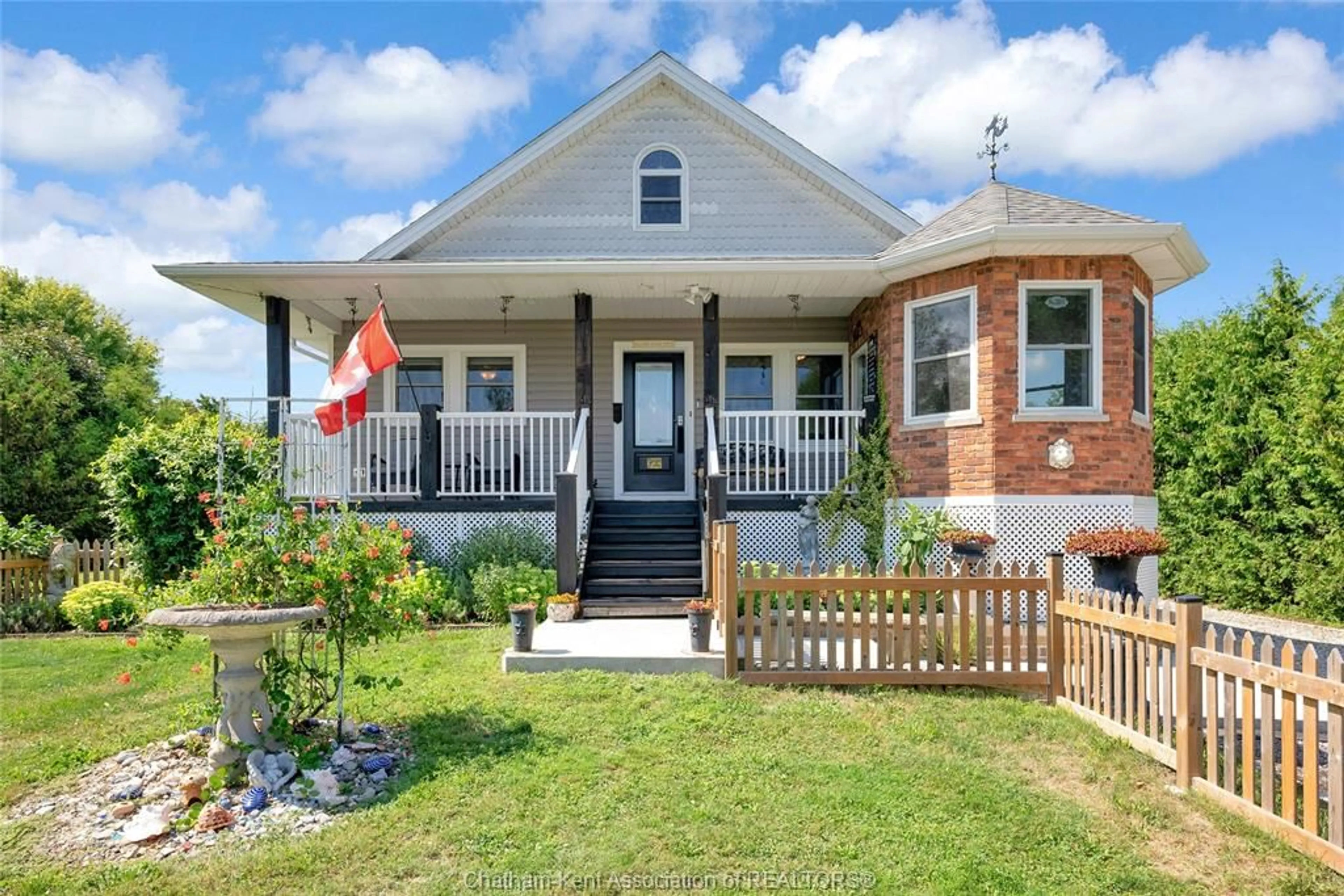 Home with brick exterior material, street for 1311 Bluff Line, Wheatley Ontario N0P 2P0