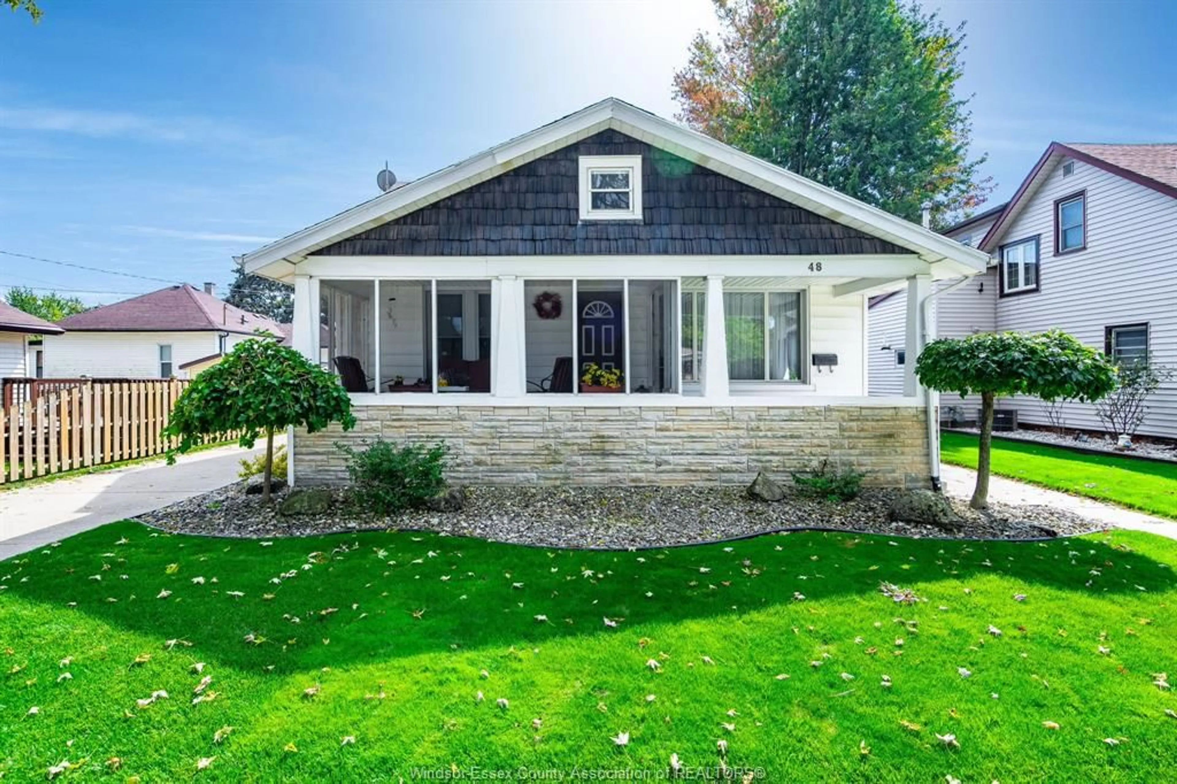 Home with vinyl exterior material, street for 48 Orange St, Leamington Ontario N8H 1P7