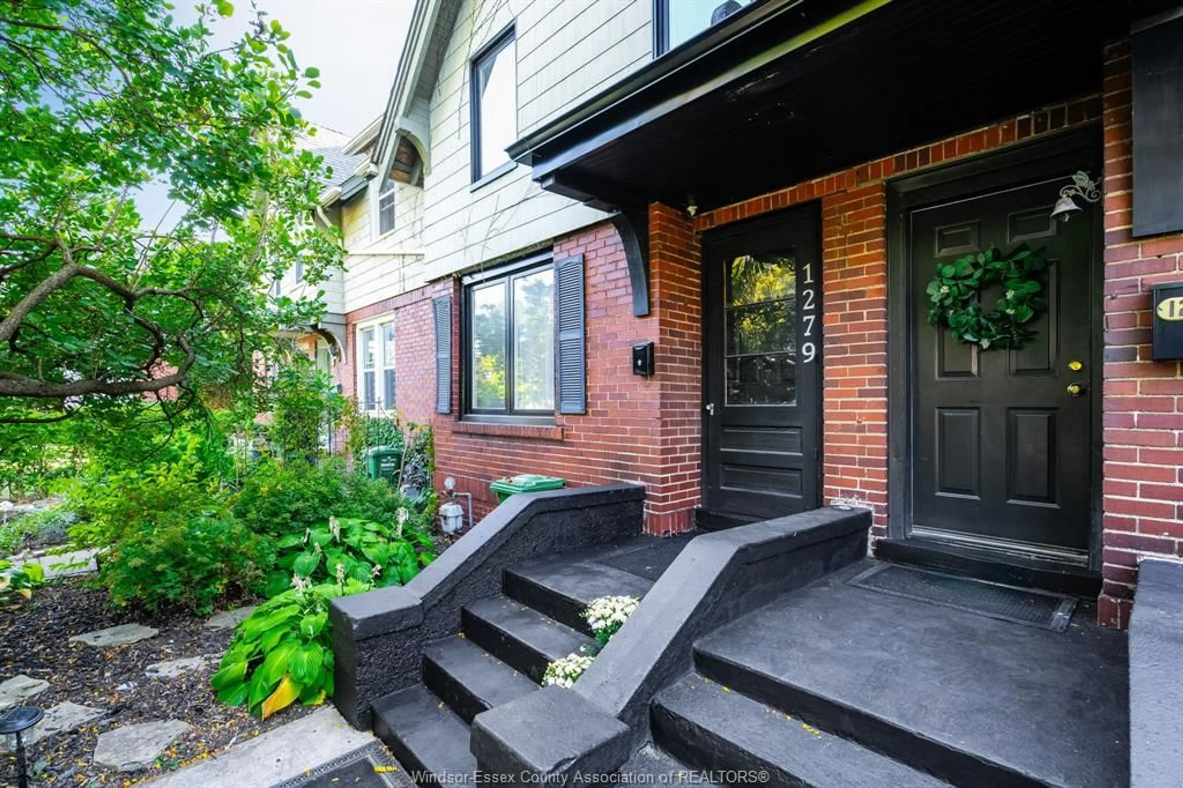 Home with brick exterior material, street for 1279 Monmouth, Windsor Ontario N8Y 3M2