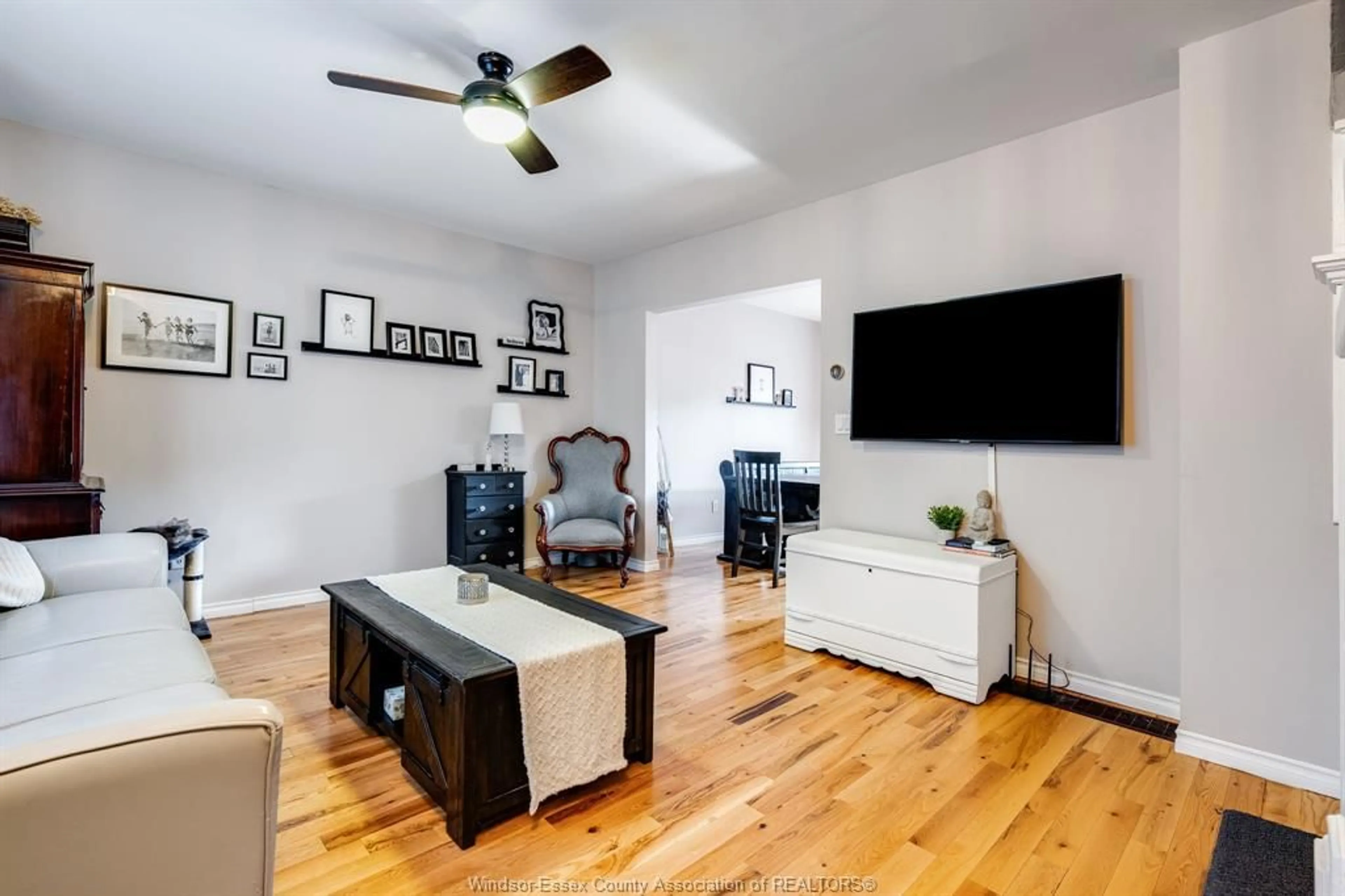 Living room with furniture, wood/laminate floor for 1279 Monmouth, Windsor Ontario N8Y 3M2