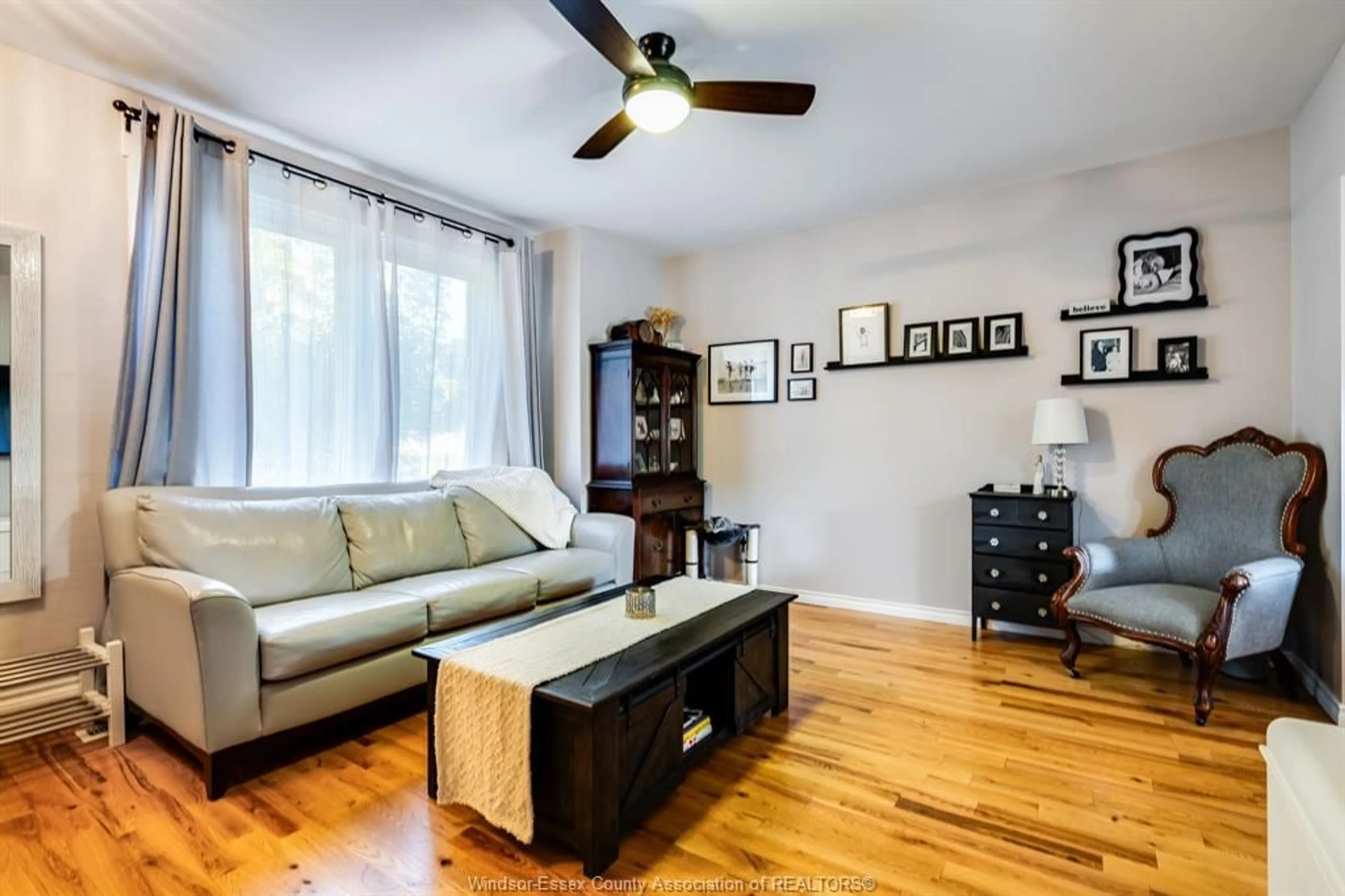 Living room with furniture, wood/laminate floor for 1279 Monmouth, Windsor Ontario N8Y 3M2