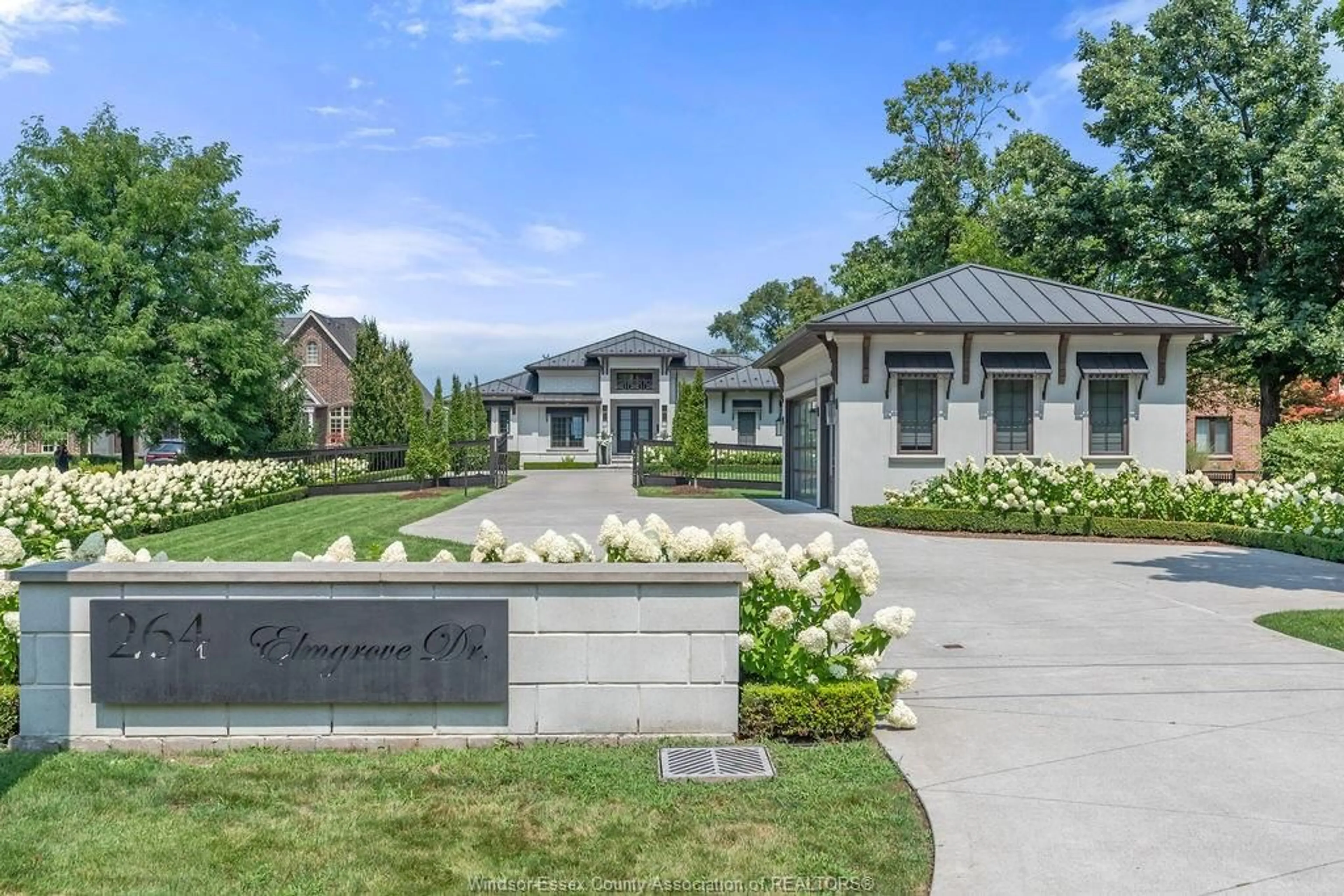 Home with brick exterior material, street for 264 ELMGROVE Dr, Lakeshore Ontario N8N 3S4