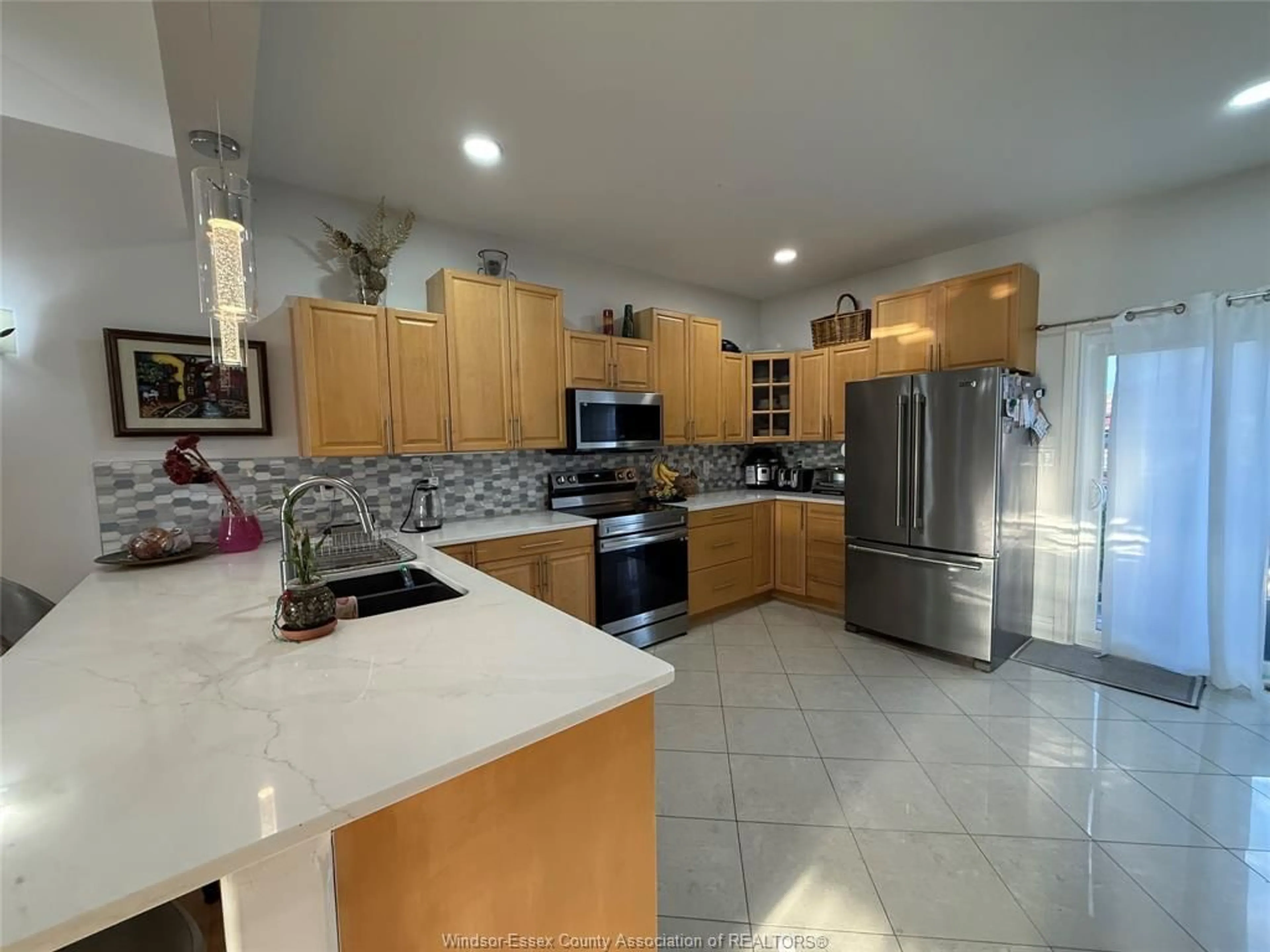 Open concept kitchen, ceramic/tile floor for 4892 BARCELONA Cres, Windsor Ontario N9G 3G1