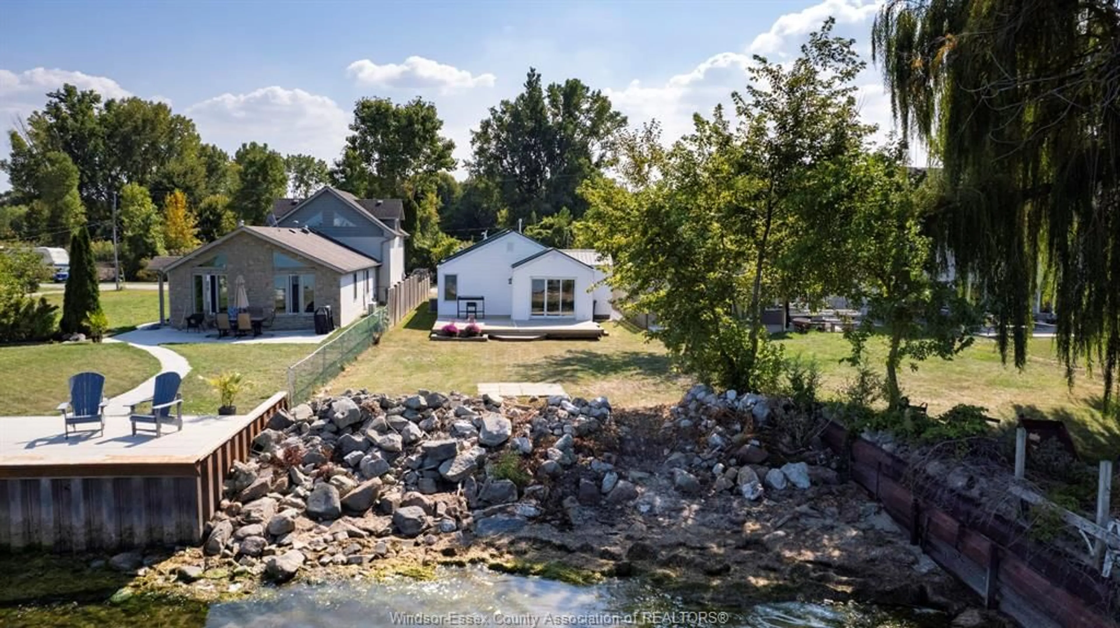 A pic from outside/outdoor area/front of a property/back of a property/a pic from drone, water/lake/river/ocean view for 1564 Caille Ave, Lakeshore Ontario N8L 0J3