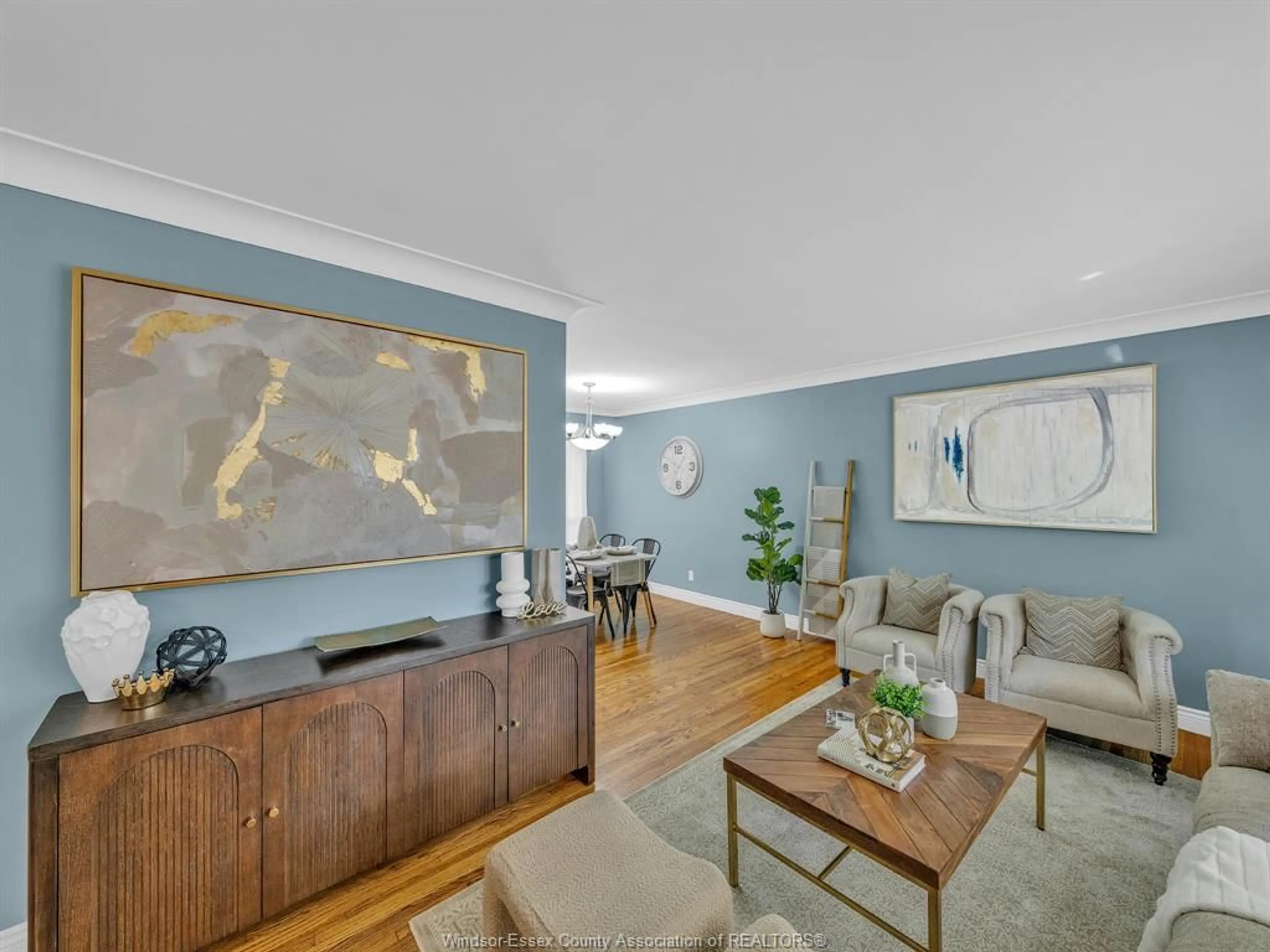 Living room with furniture, wood/laminate floor for 3379 Askin Ave, Windsor Ontario N9E 3J6