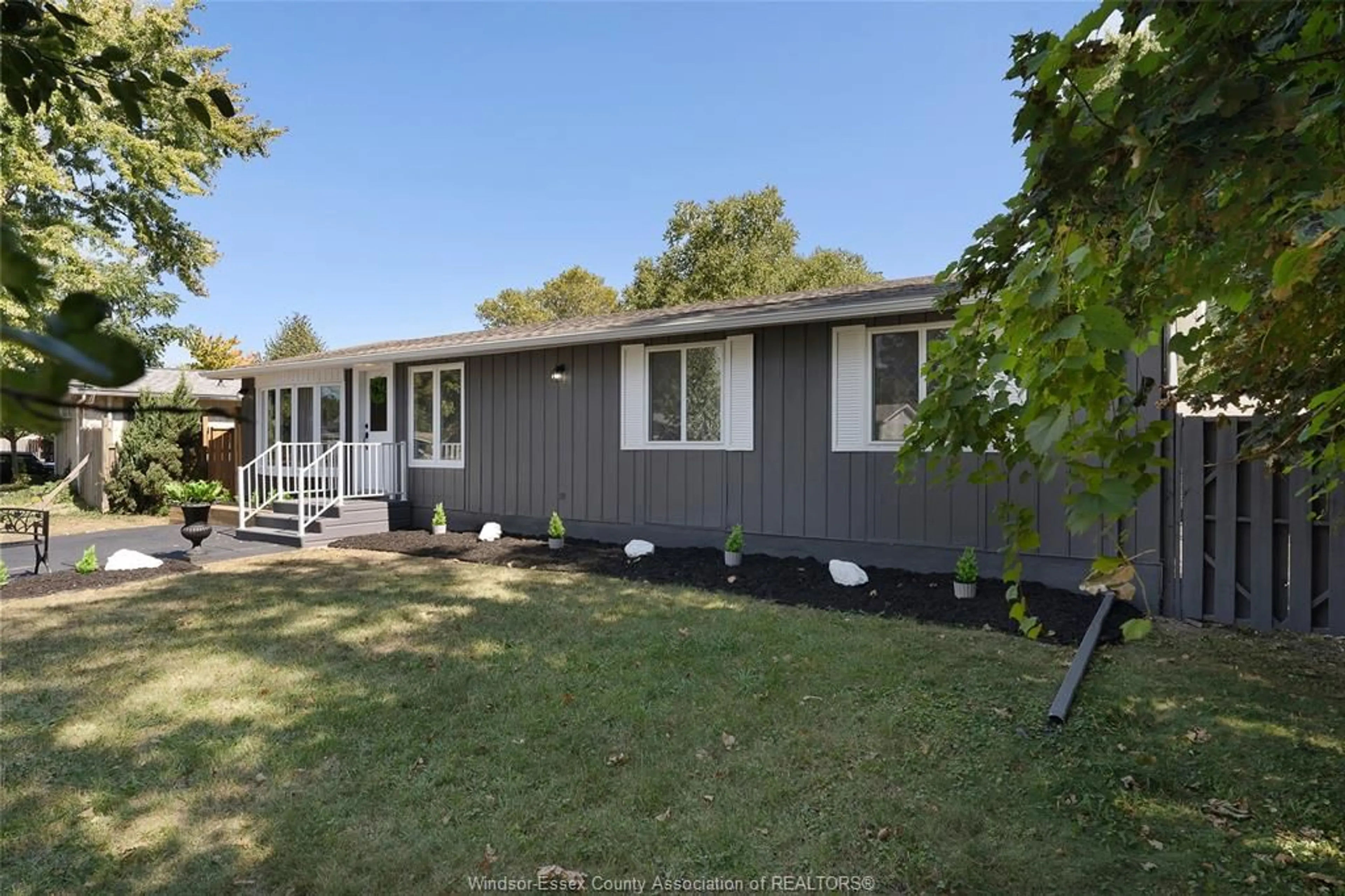 Home with vinyl exterior material, street for 10135 CALEDON Crt, Windsor Ontario N8R 1C7
