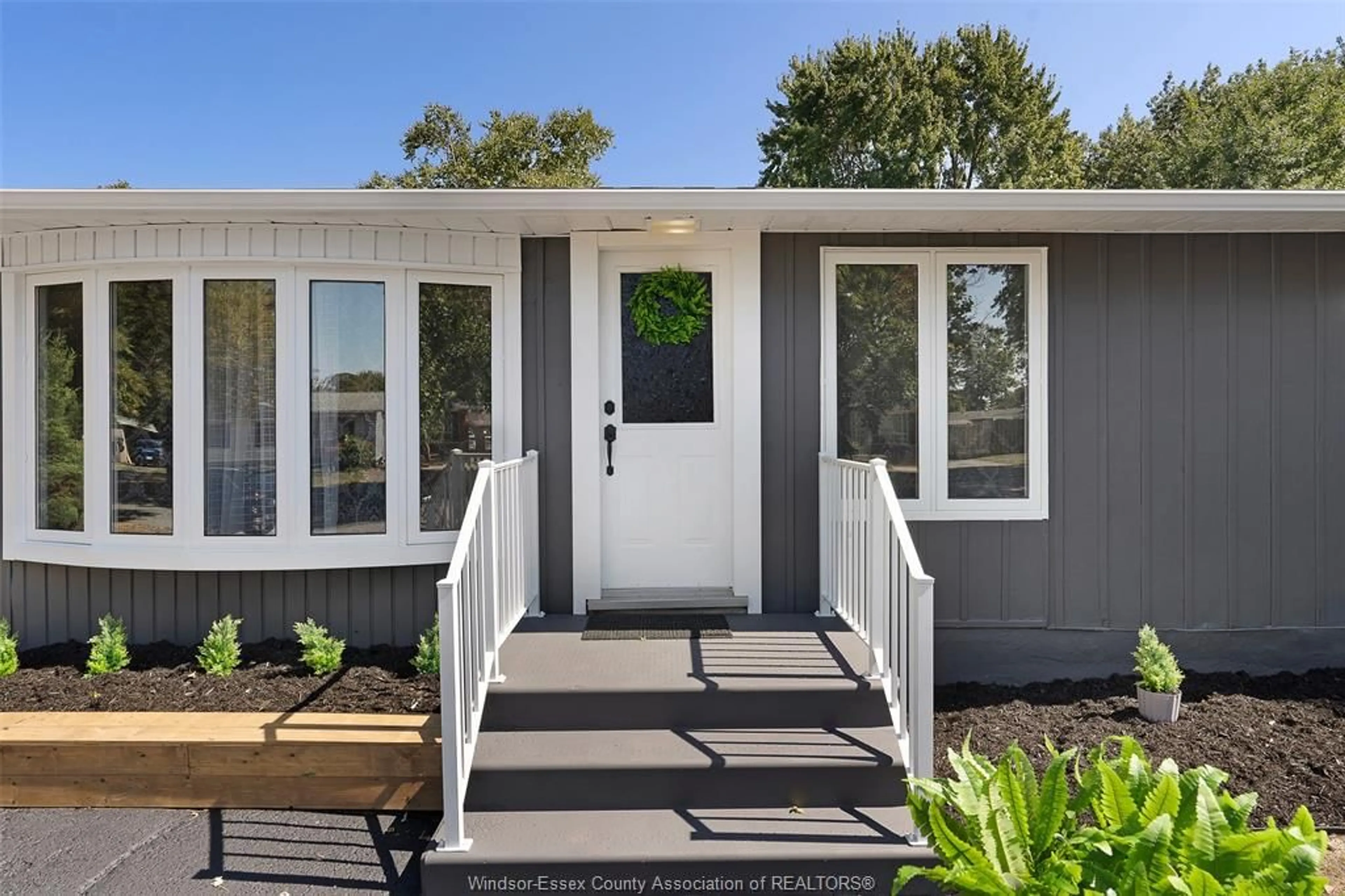 Home with vinyl exterior material, street for 10135 CALEDON Crt, Windsor Ontario N8R 1C7