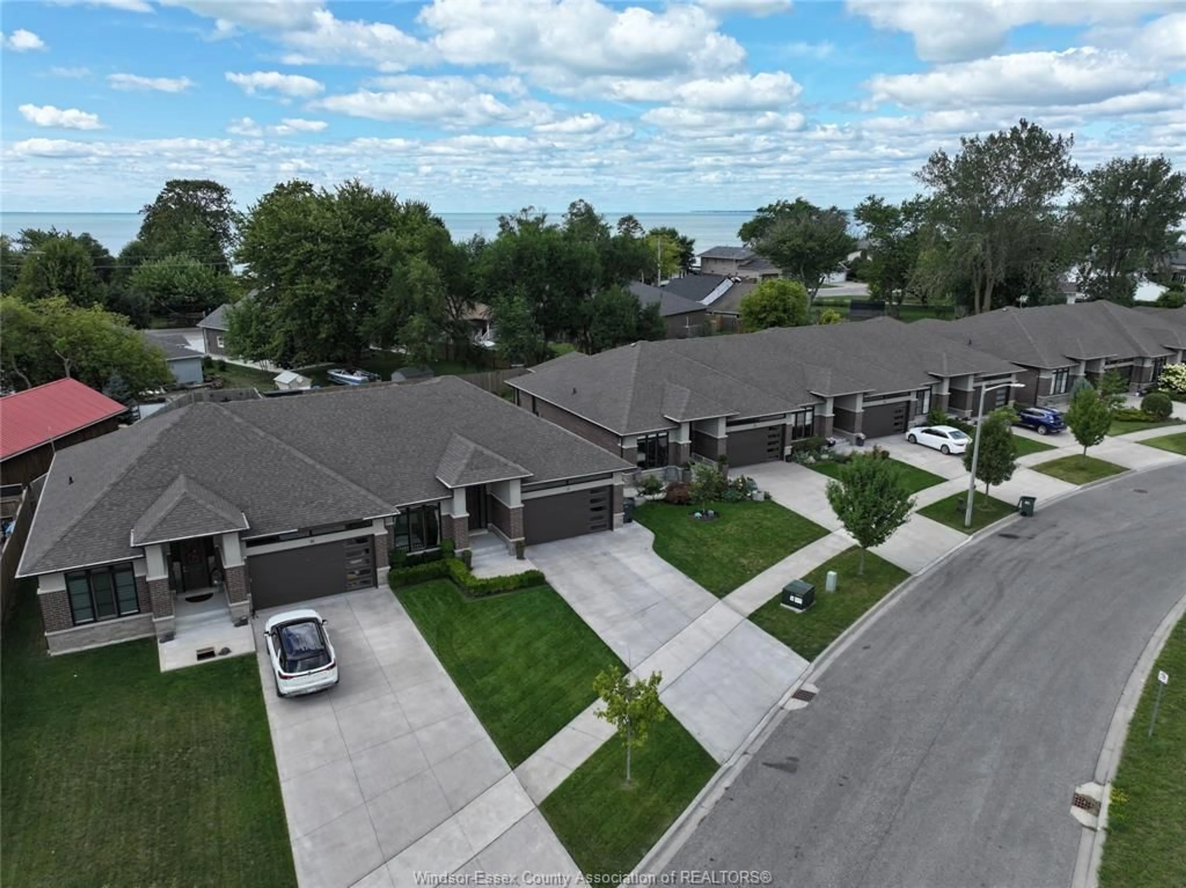A pic from outside/outdoor area/front of a property/back of a property/a pic from drone, unknown for 17 TANGLEWOOD Dr, Leamington Ontario N8H 0C8