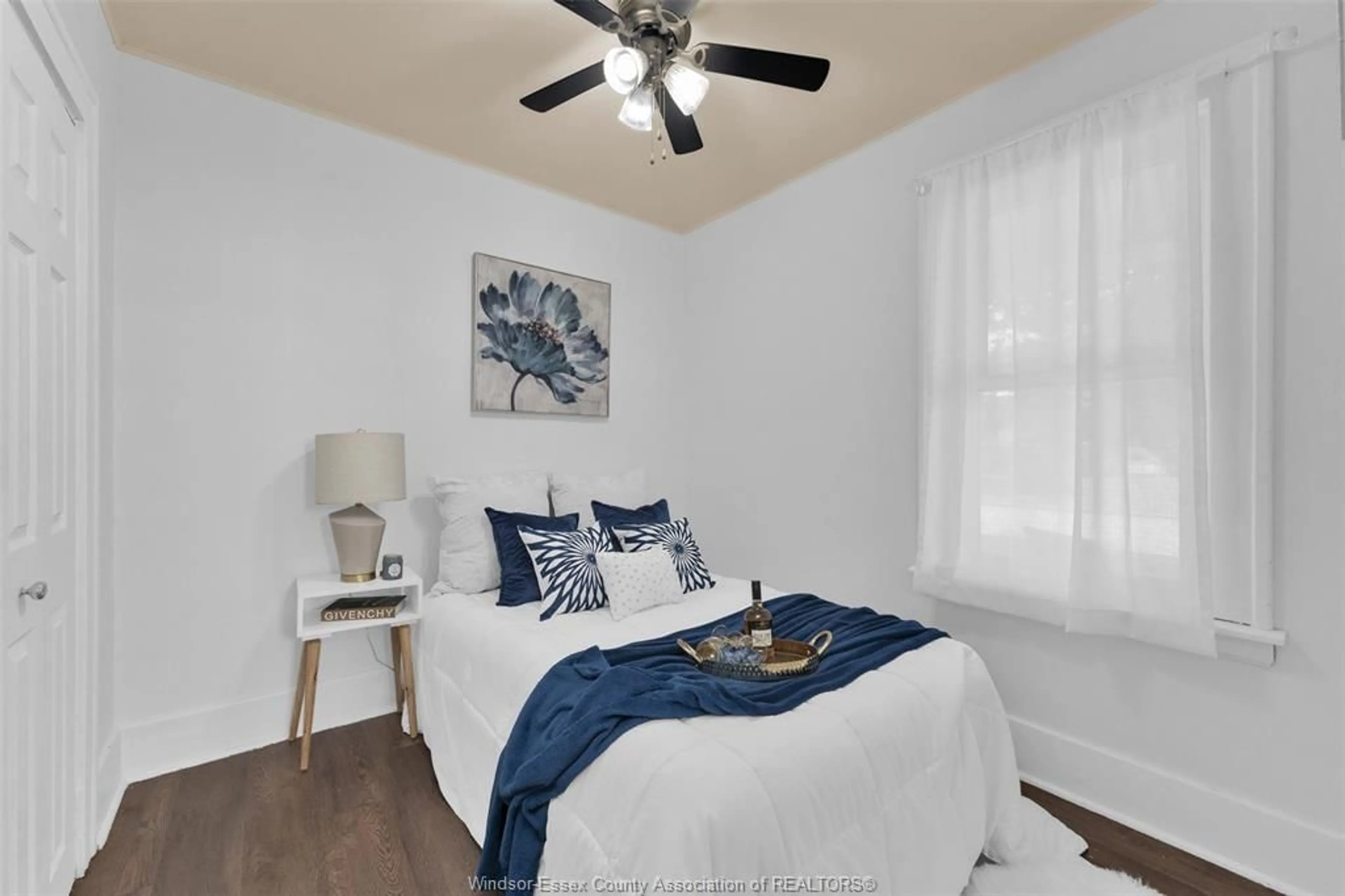 Bedroom with bed, wood/laminate floor for 1694 MERCER St, Windsor Ontario N8X 3P7