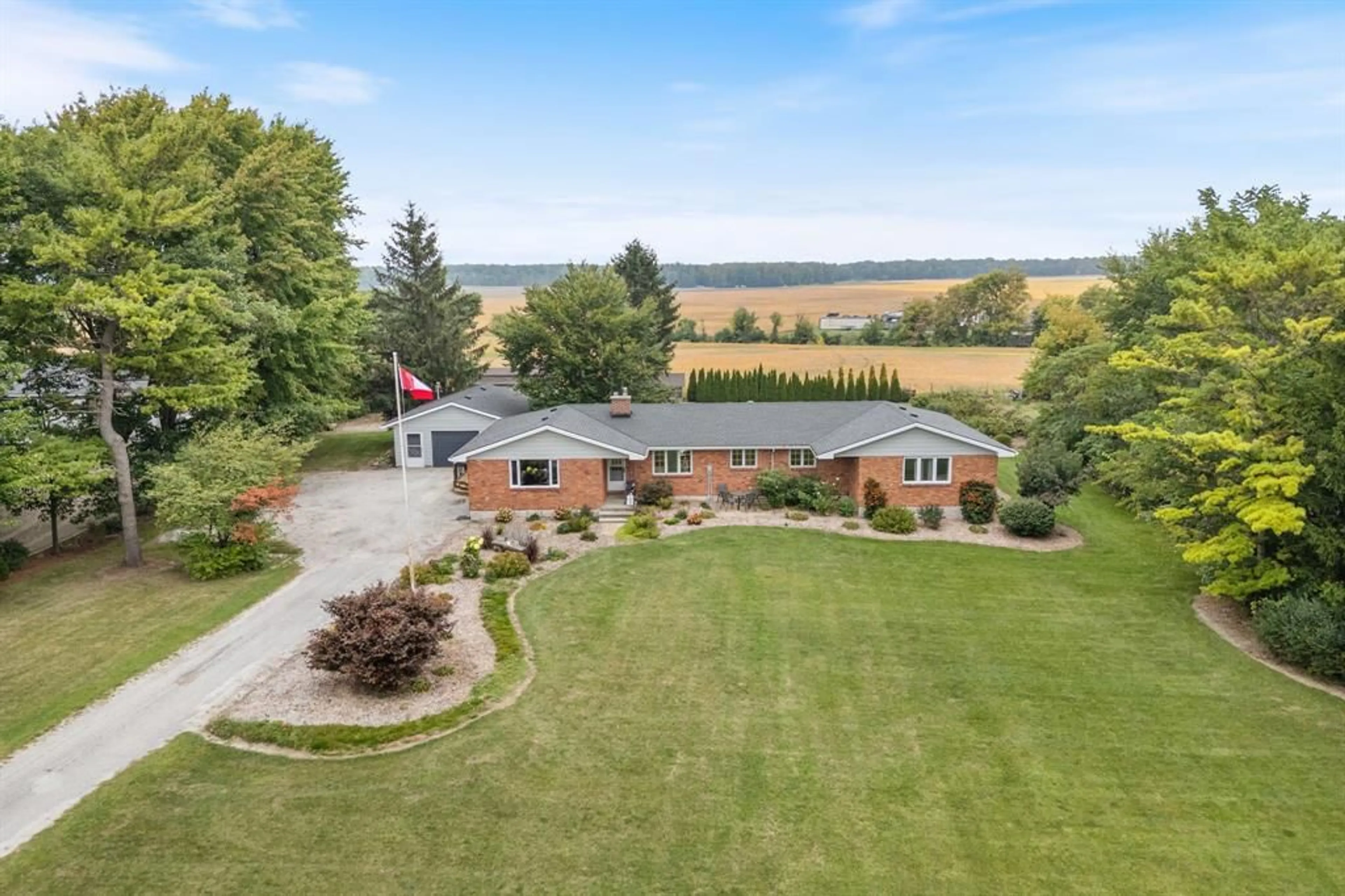 A pic from outside/outdoor area/front of a property/back of a property/a pic from drone, water/lake/river/ocean view for 4682 LONDON Line, Plympton-Wyoming Ontario N0N 1T0