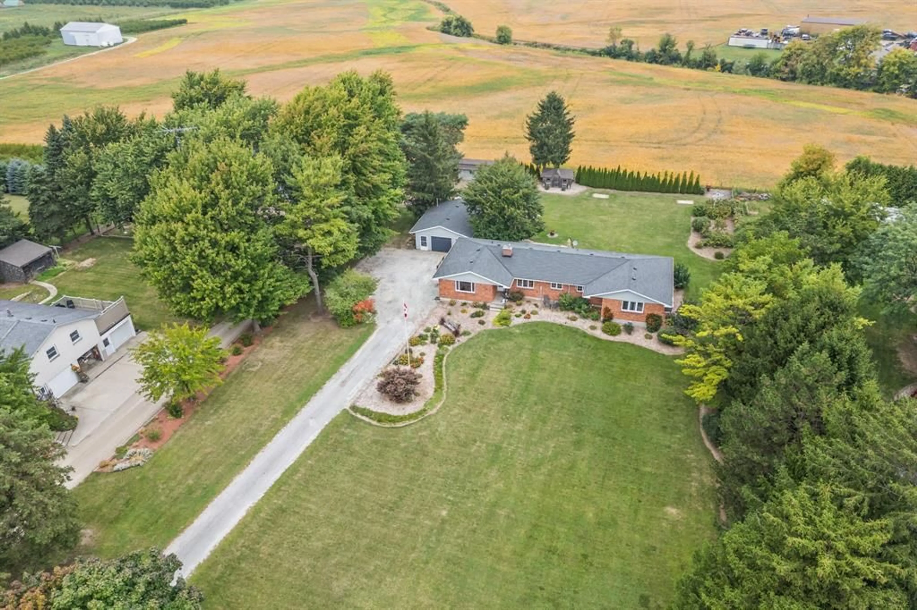 A pic from outside/outdoor area/front of a property/back of a property/a pic from drone, mountain view for 4682 LONDON Line, Plympton-Wyoming Ontario N0N 1T0