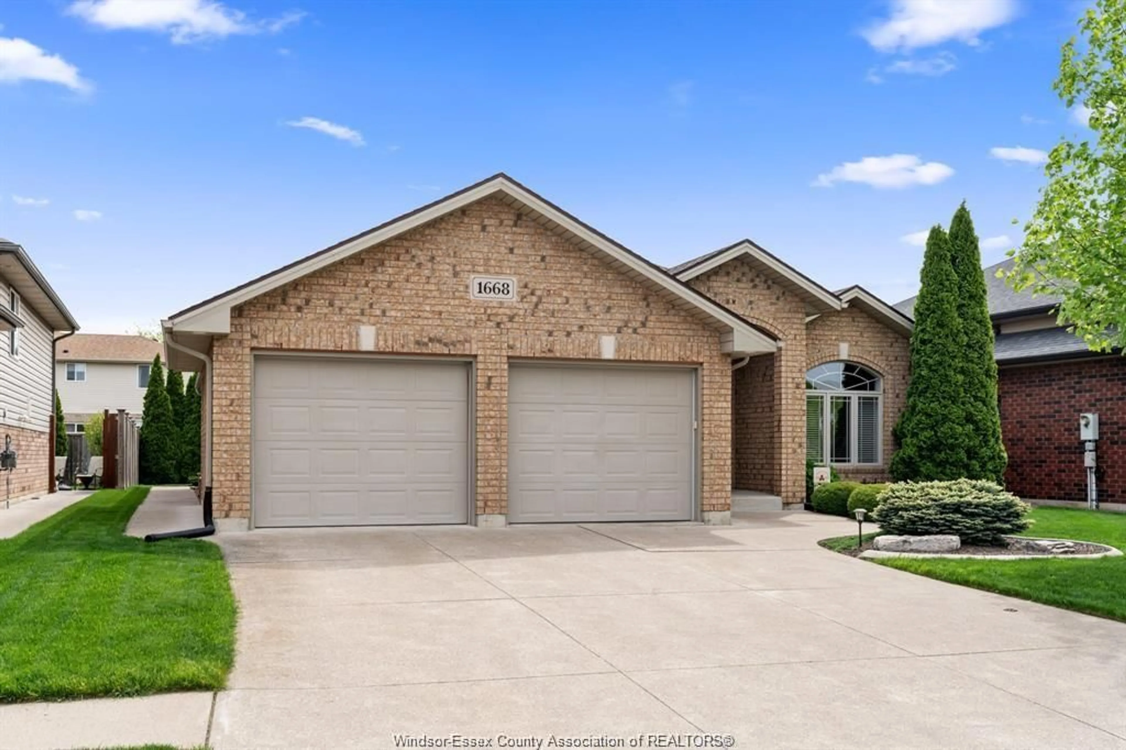 Home with brick exterior material, street for 1668 MAGNOLIA Ave, Windsor Ontario N8P 1Z1