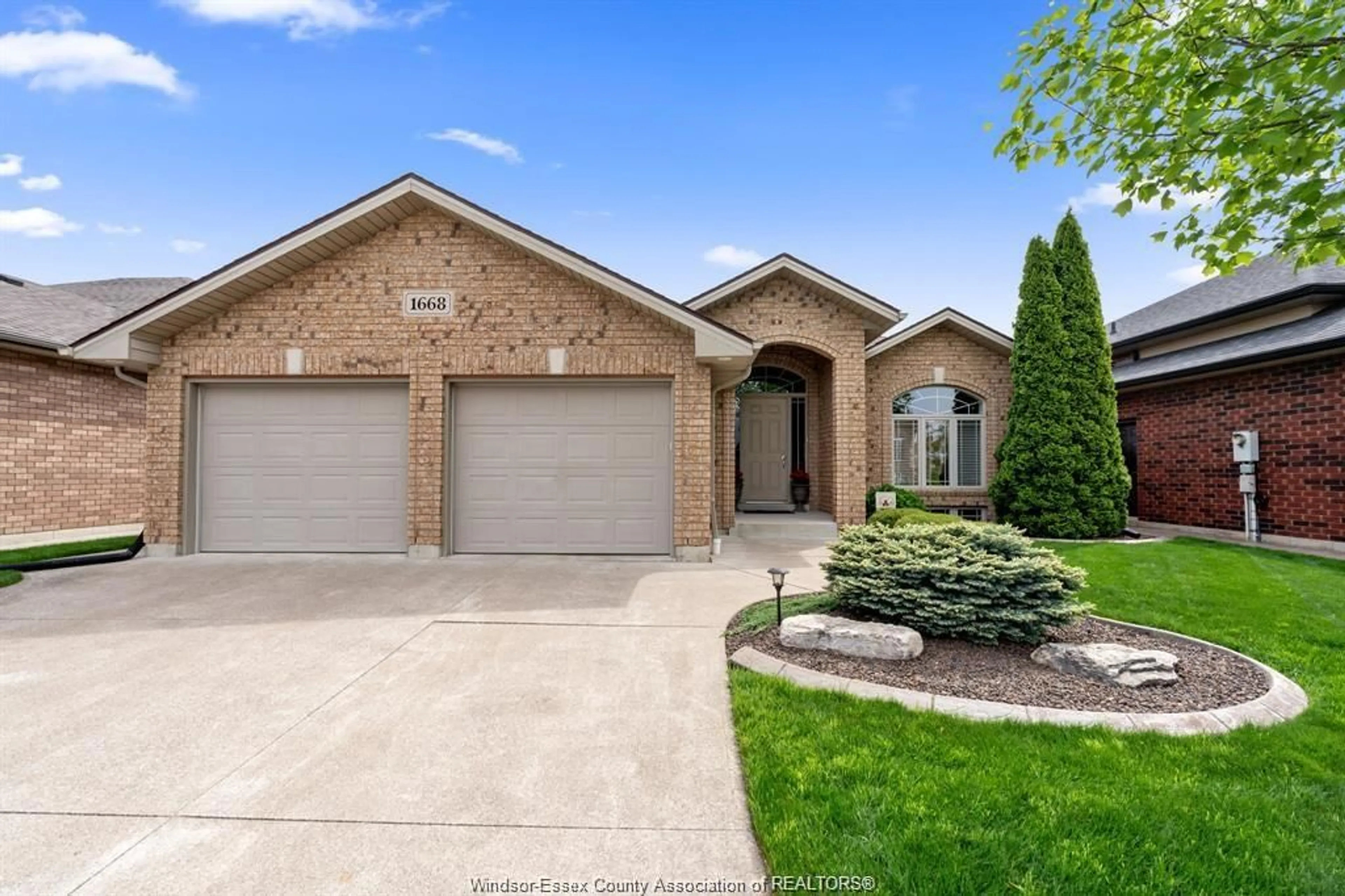 Home with brick exterior material, street for 1668 MAGNOLIA Ave, Windsor Ontario N8P 1Z1