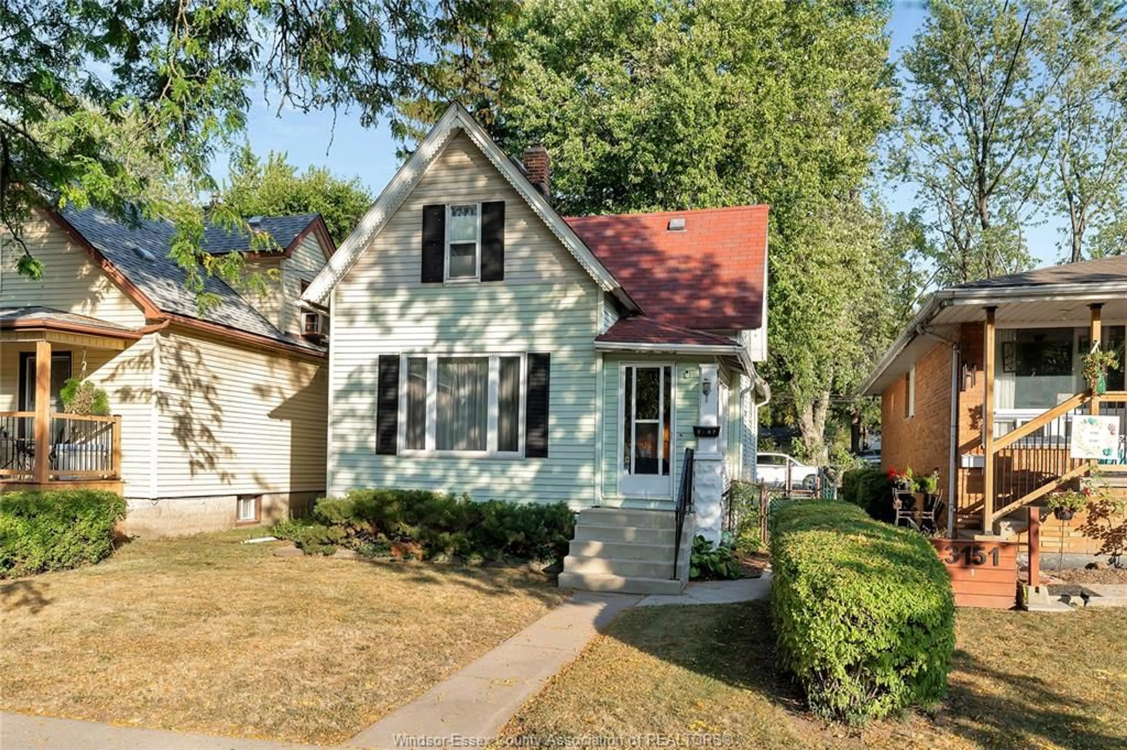 Home with vinyl exterior material, street for 3147 WYANDOTTE St, Windsor Ontario N9C 1M7