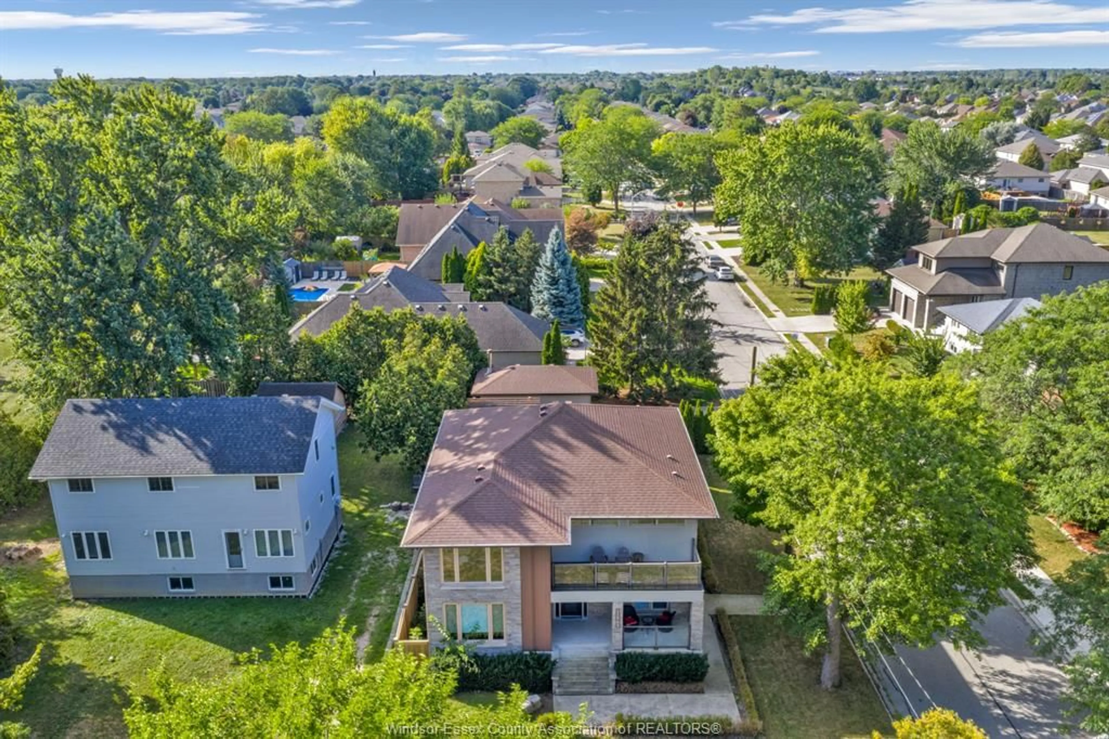 A pic from outside/outdoor area/front of a property/back of a property/a pic from drone, unknown for 11965 RIVERSIDE Dr, Windsor Ontario N8P 1A8