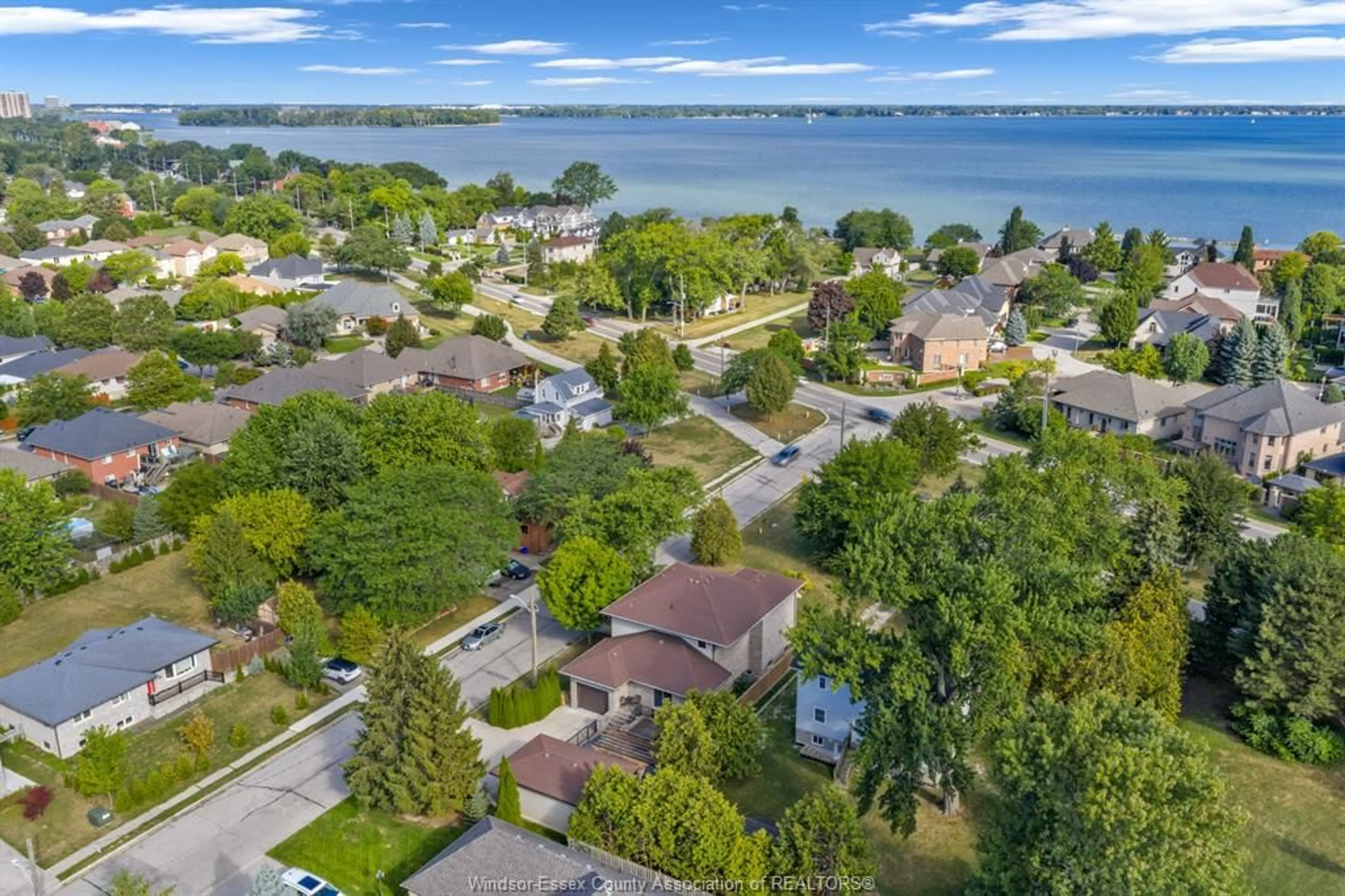 A pic from outside/outdoor area/front of a property/back of a property/a pic from drone, water/lake/river/ocean view for 11965 RIVERSIDE Dr, Windsor Ontario N8P 1A8