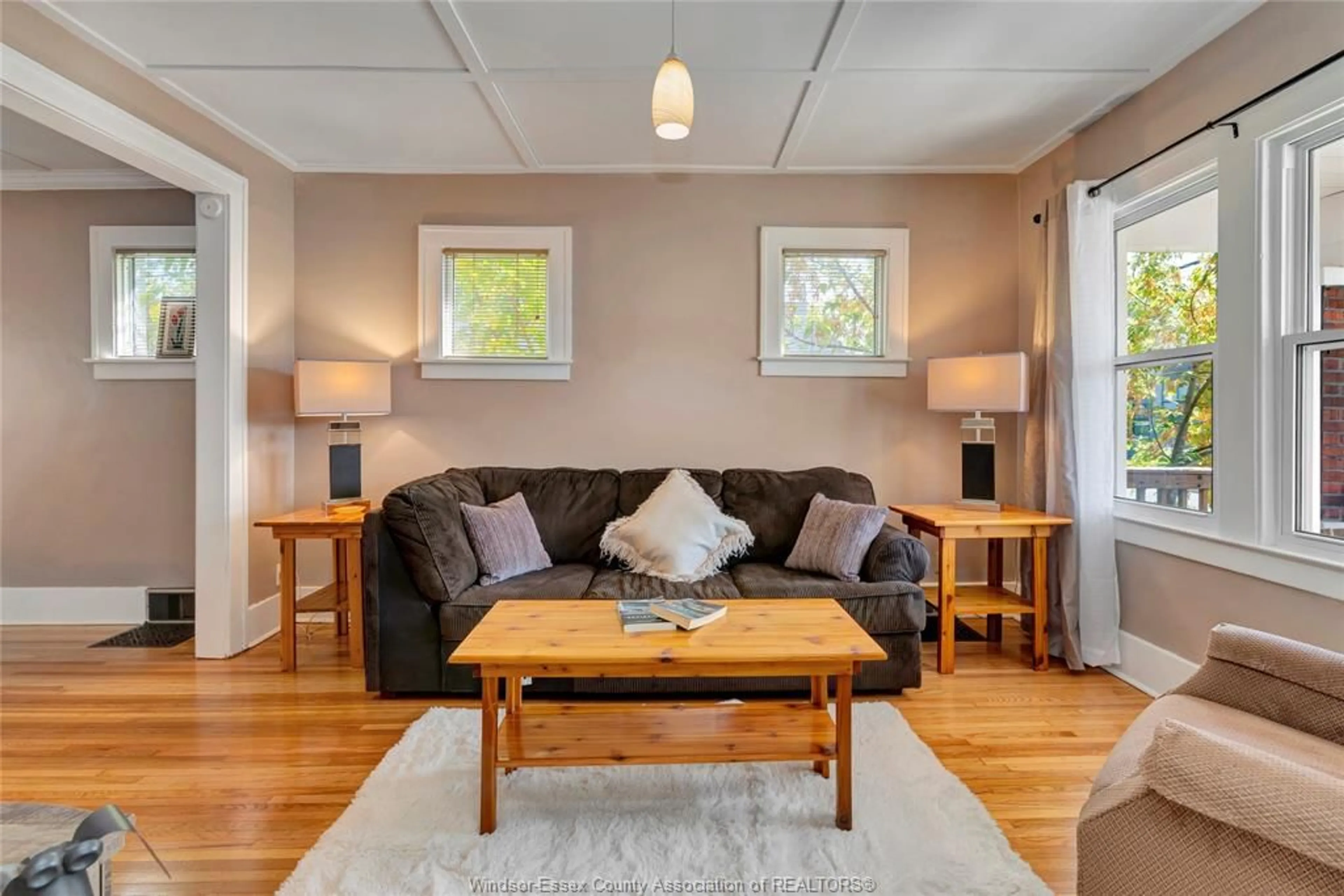 Living room with furniture, wood/laminate floor for 936 ARTHUR Rd, Windsor Ontario N8Y 3Y3