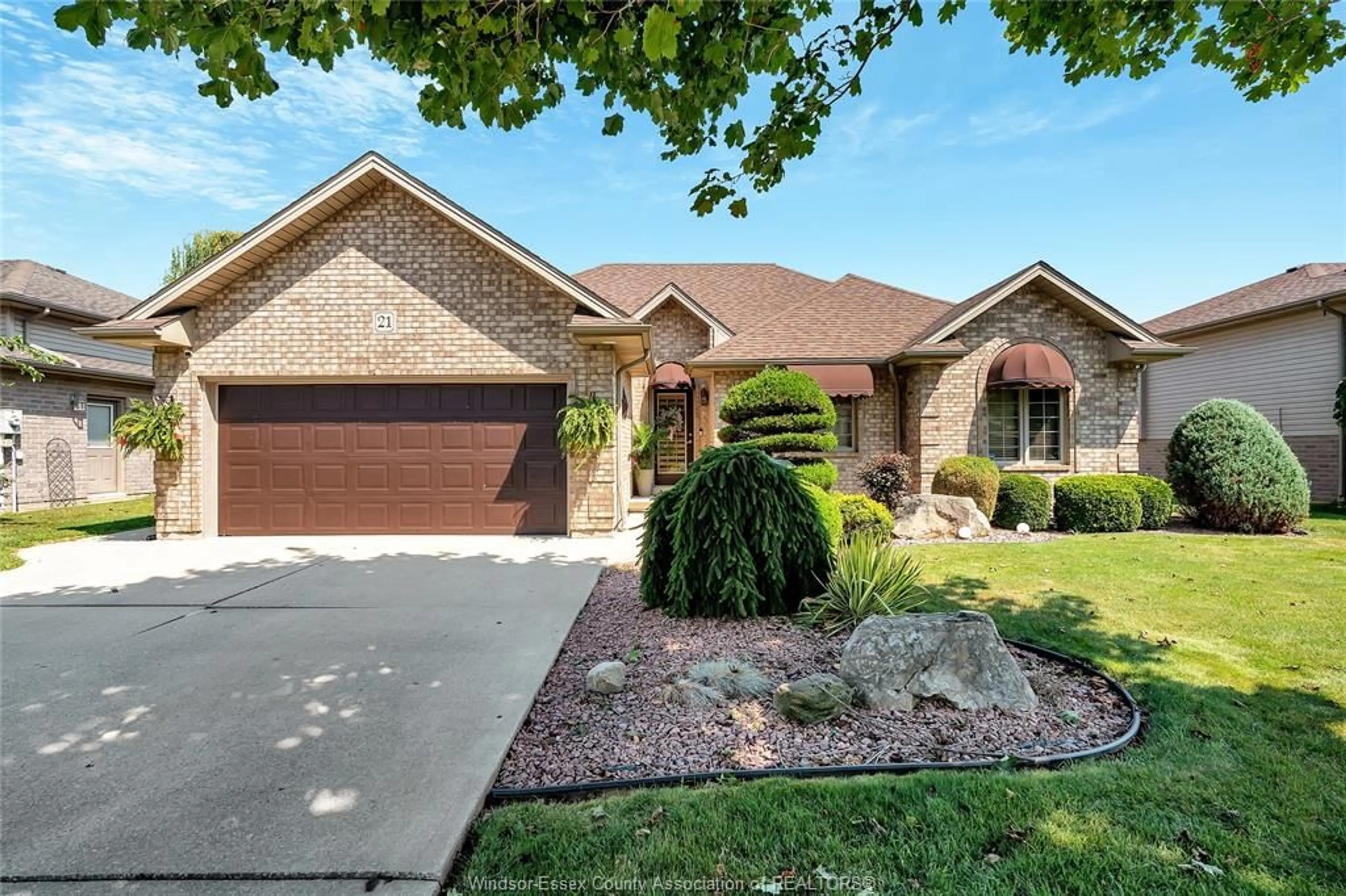 Home with brick exterior material, street for 21 CONSERVATION Blvd, Kingsville Ontario N9Y 4E4