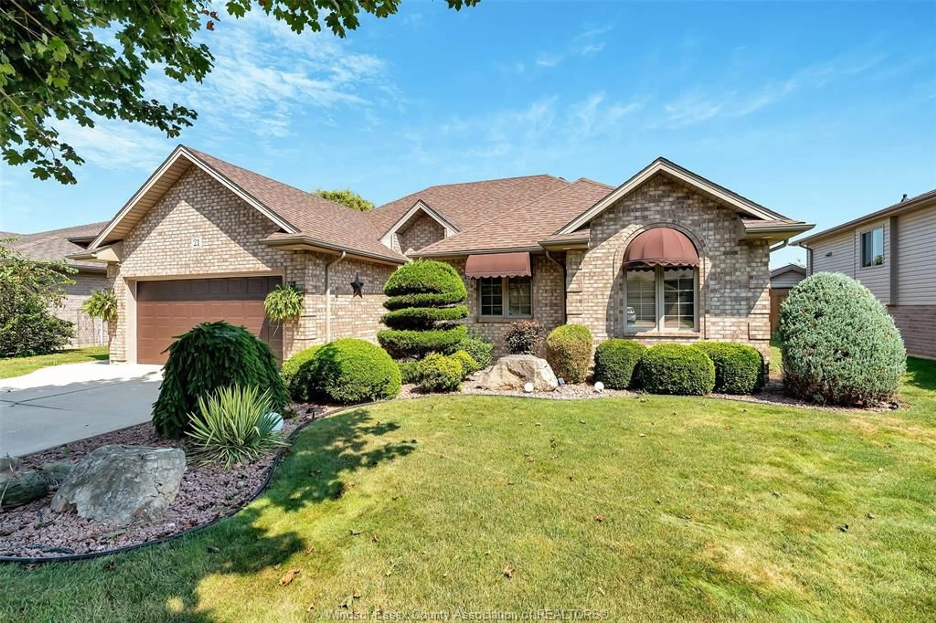 Home with brick exterior material, street for 21 CONSERVATION Blvd, Kingsville Ontario N9Y 4E4