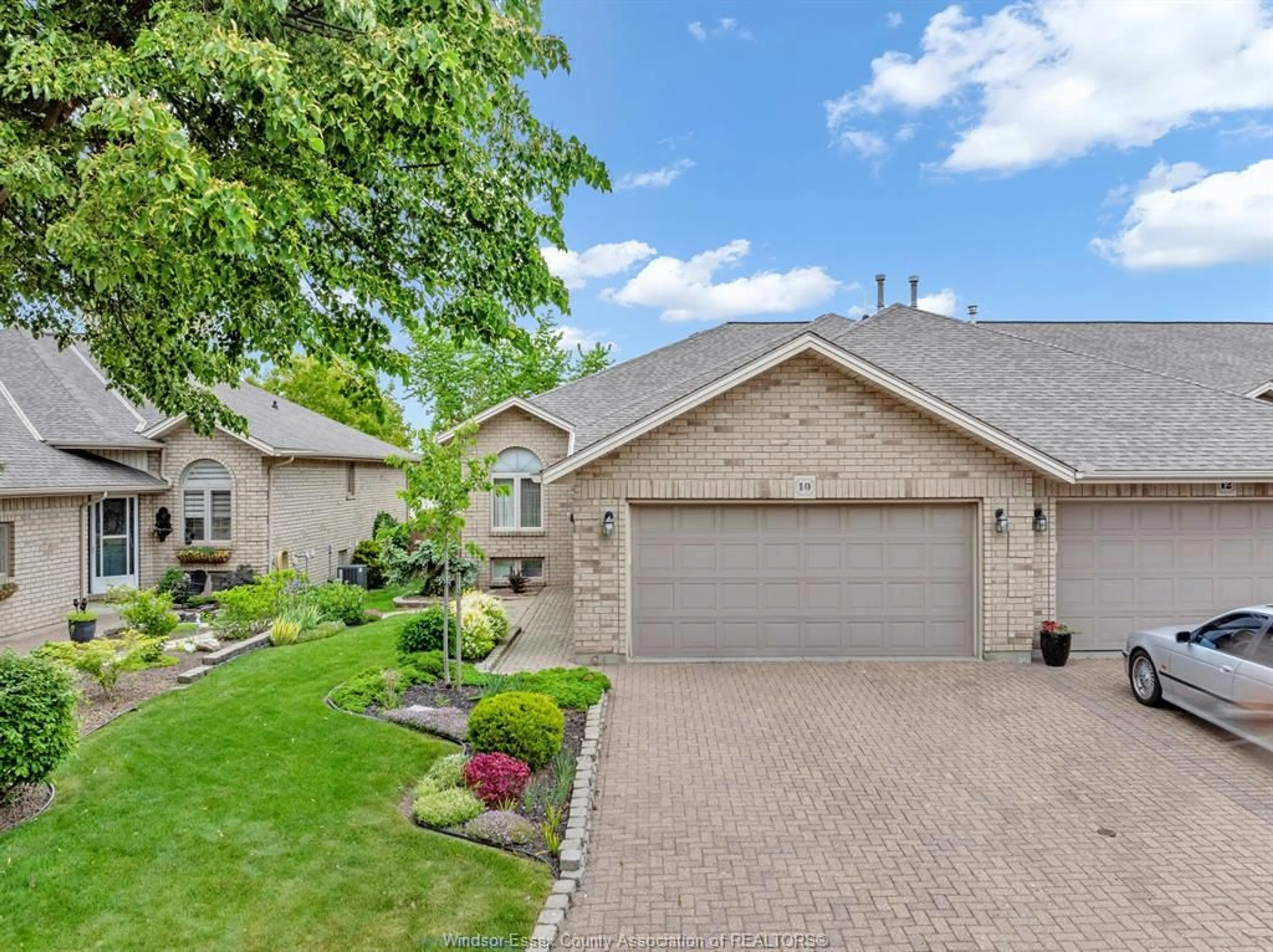 Home with brick exterior material, street for 10 QUEENS HILL Cres, Leamington Ontario N8H 5M6