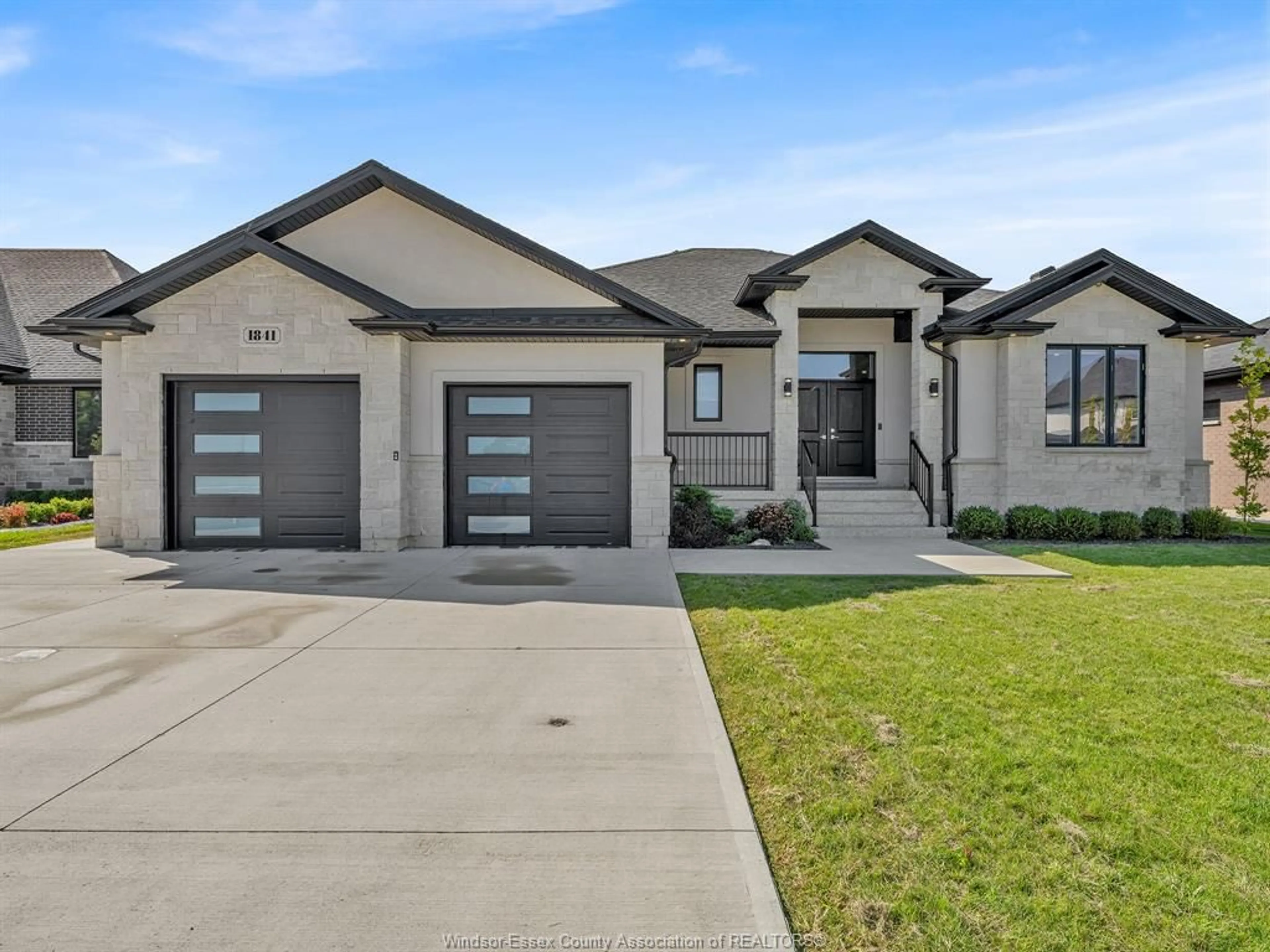 Home with brick exterior material, street for 1841 Queens Valley Dr, Kingsville Ontario N9Y 0G6