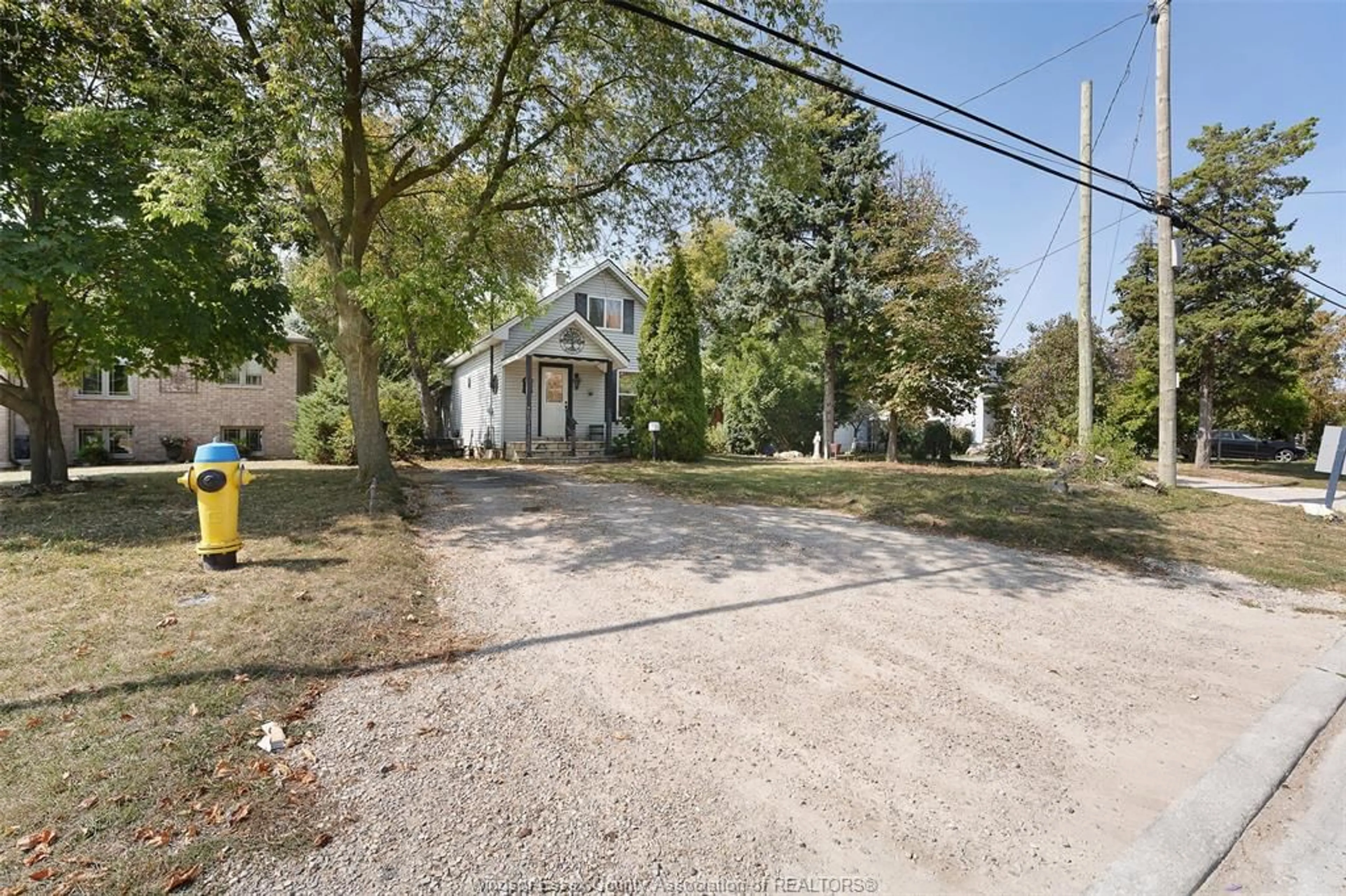 A pic from outside/outdoor area/front of a property/back of a property/a pic from drone, street for 1665 LESPERANCE Rd, Tecumseh Ontario N8N 1Y2