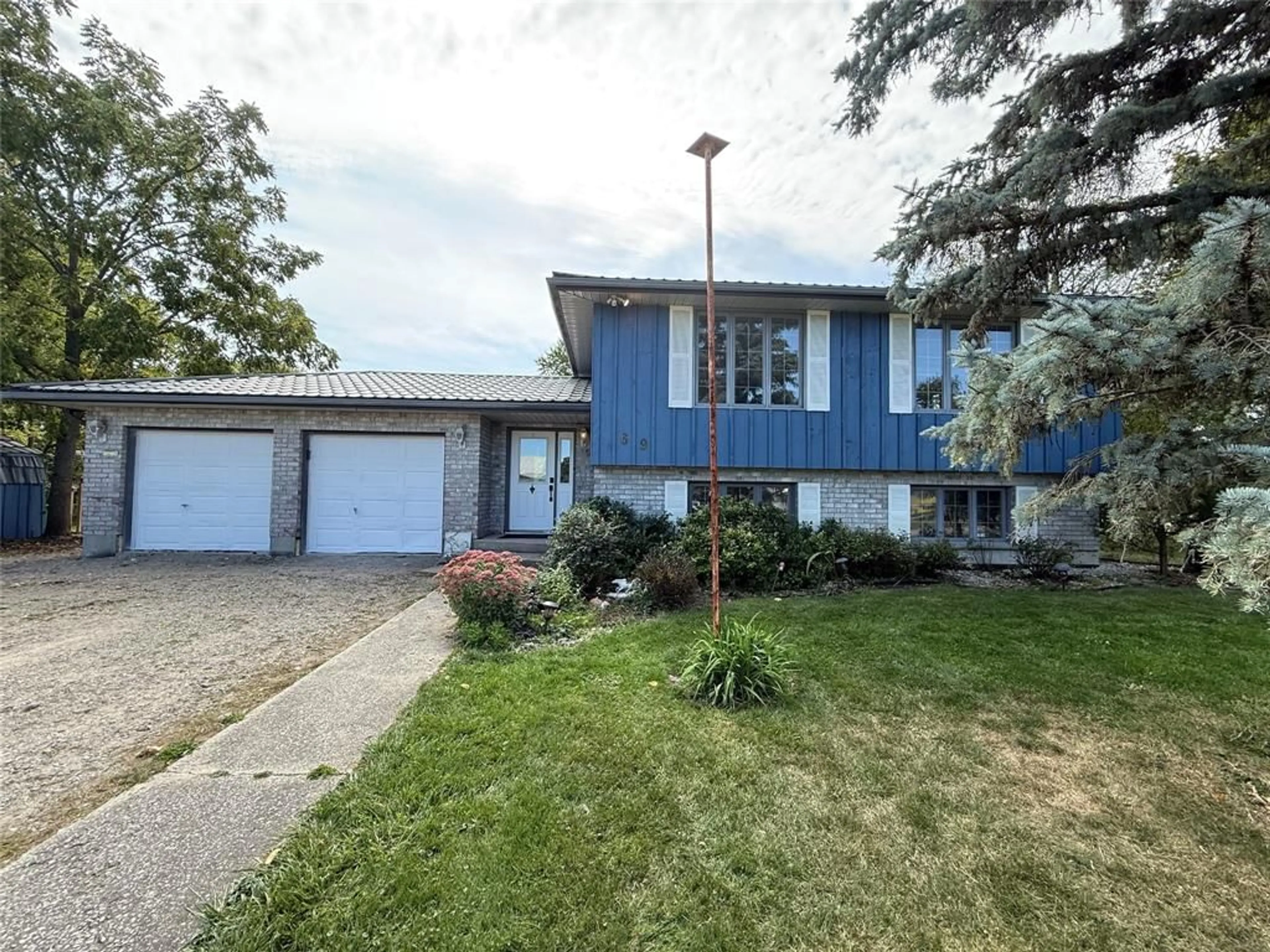 Home with vinyl exterior material, street for 69 NELSON St, Lambton Shores Ontario N0M 2N0