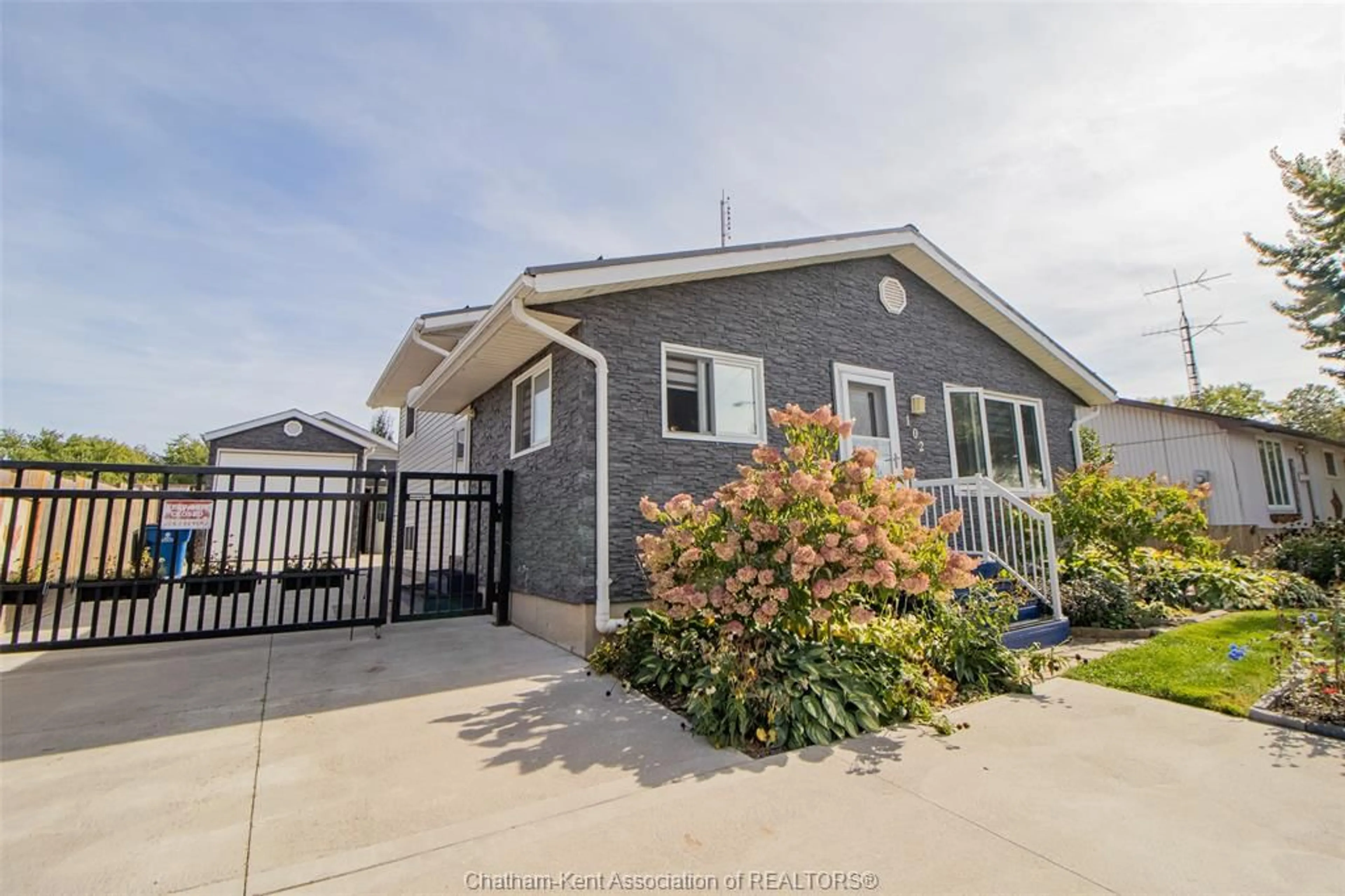 Home with vinyl exterior material, street for 102 Sherman St, Blenheim Ontario N0P 1A0