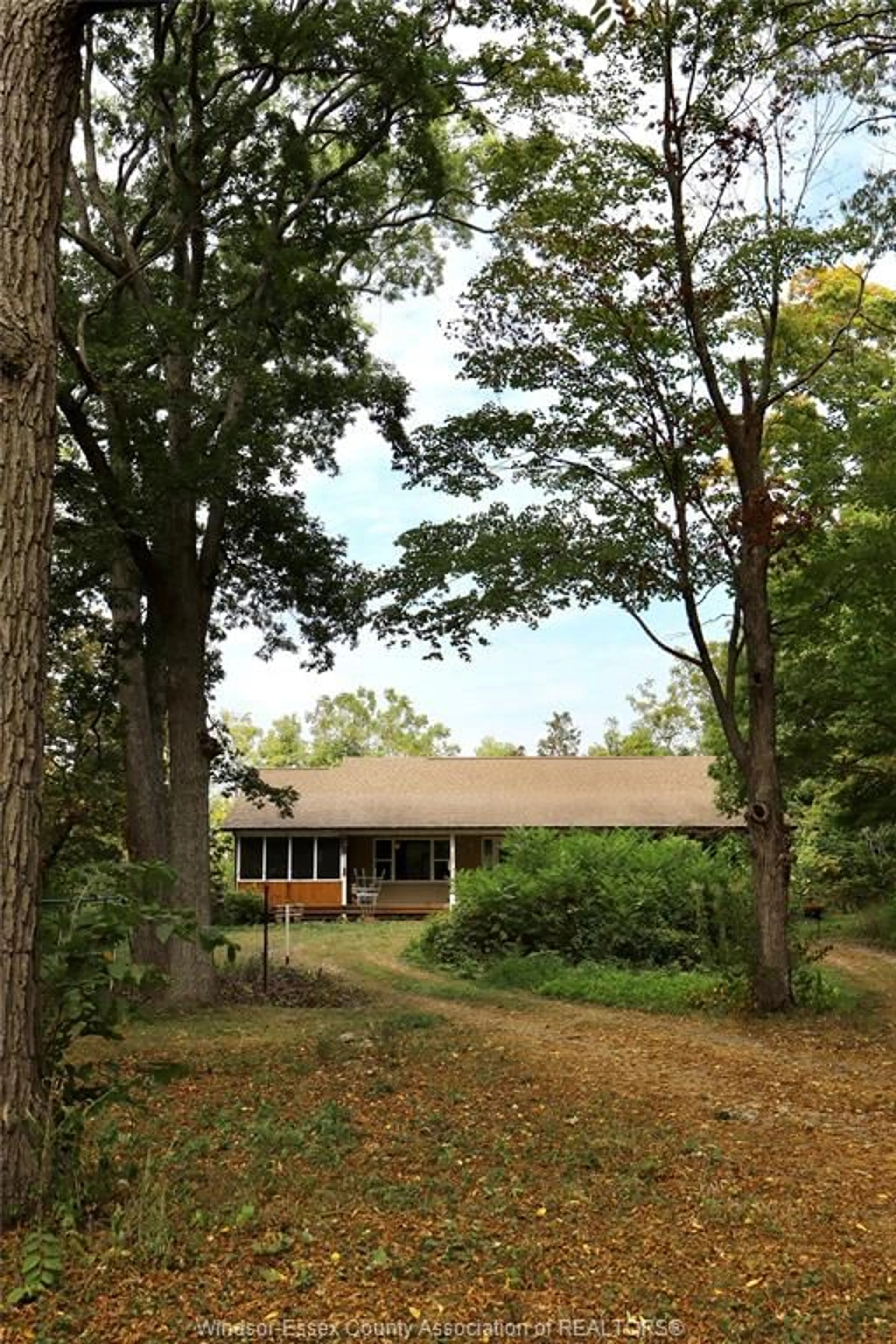 Home with vinyl exterior material, forest/trees view for 761 East West Rd, Pelee Island Ontario N0R 1M0