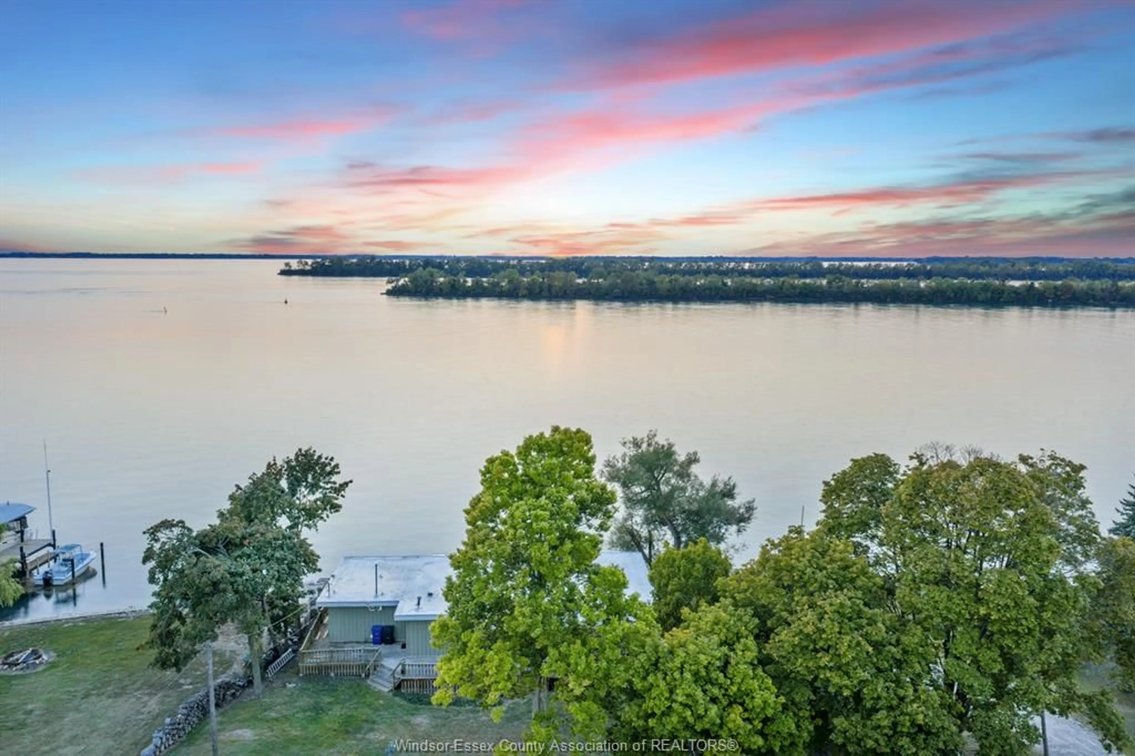 A pic from outside/outdoor area/front of a property/back of a property/a pic from drone, water/lake/river/ocean view for 1166 FRONT Rd, Amherstburg Ontario N9V 2M6