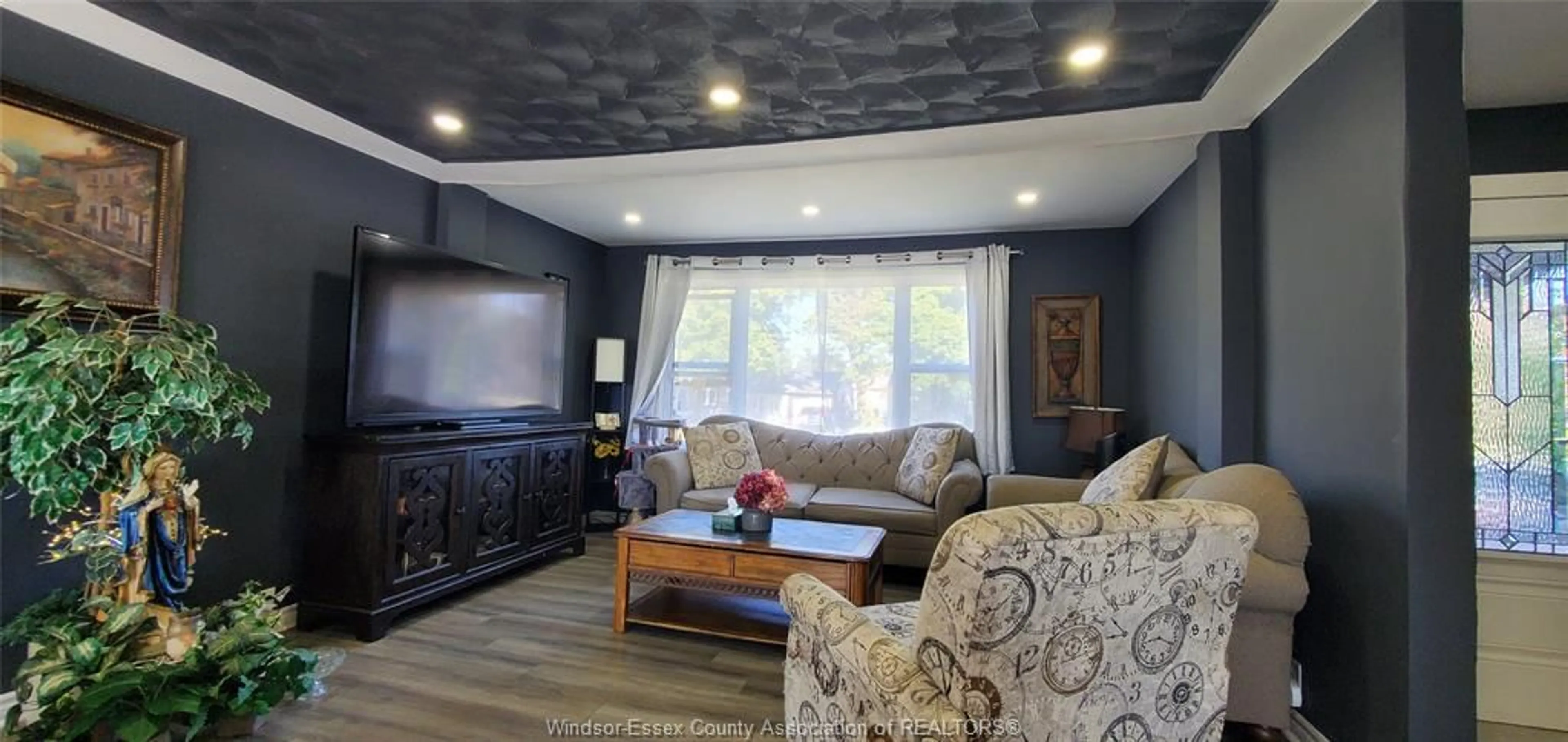 Living room with furniture, wood/laminate floor for 3025 WOODLAWN Ave, Windsor Ontario N8W 2H8