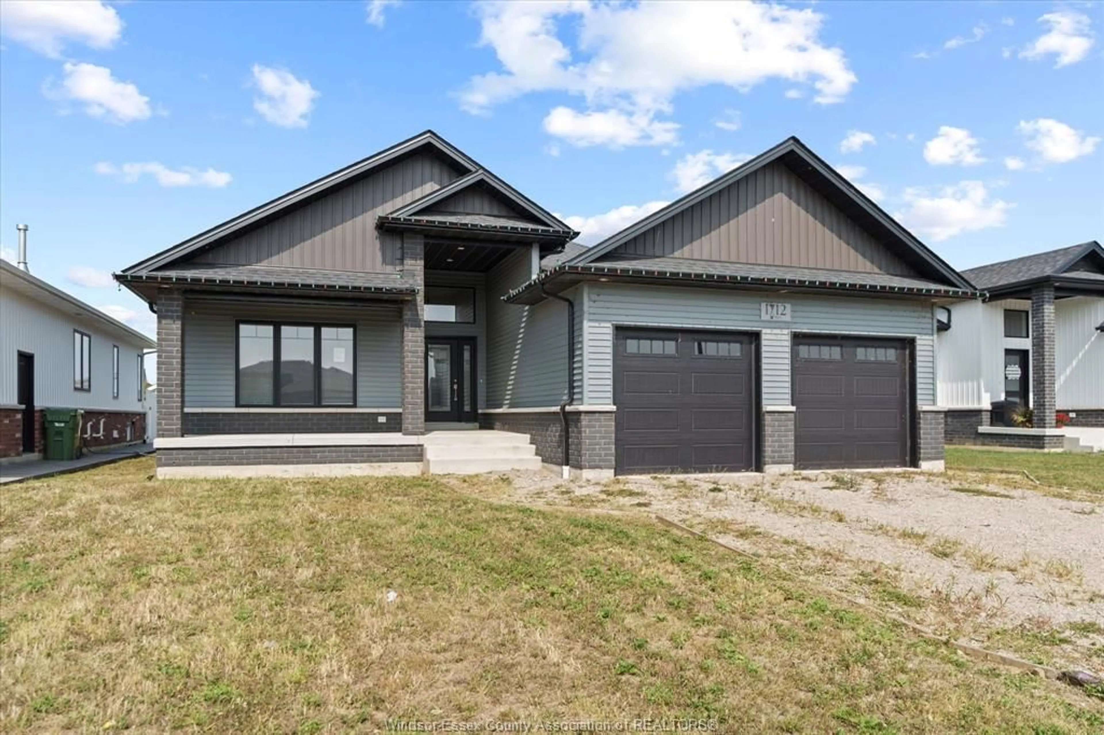 Home with vinyl exterior material, street for 1712 MUCCI Dr, Kingsville Ontario N0P 2G0