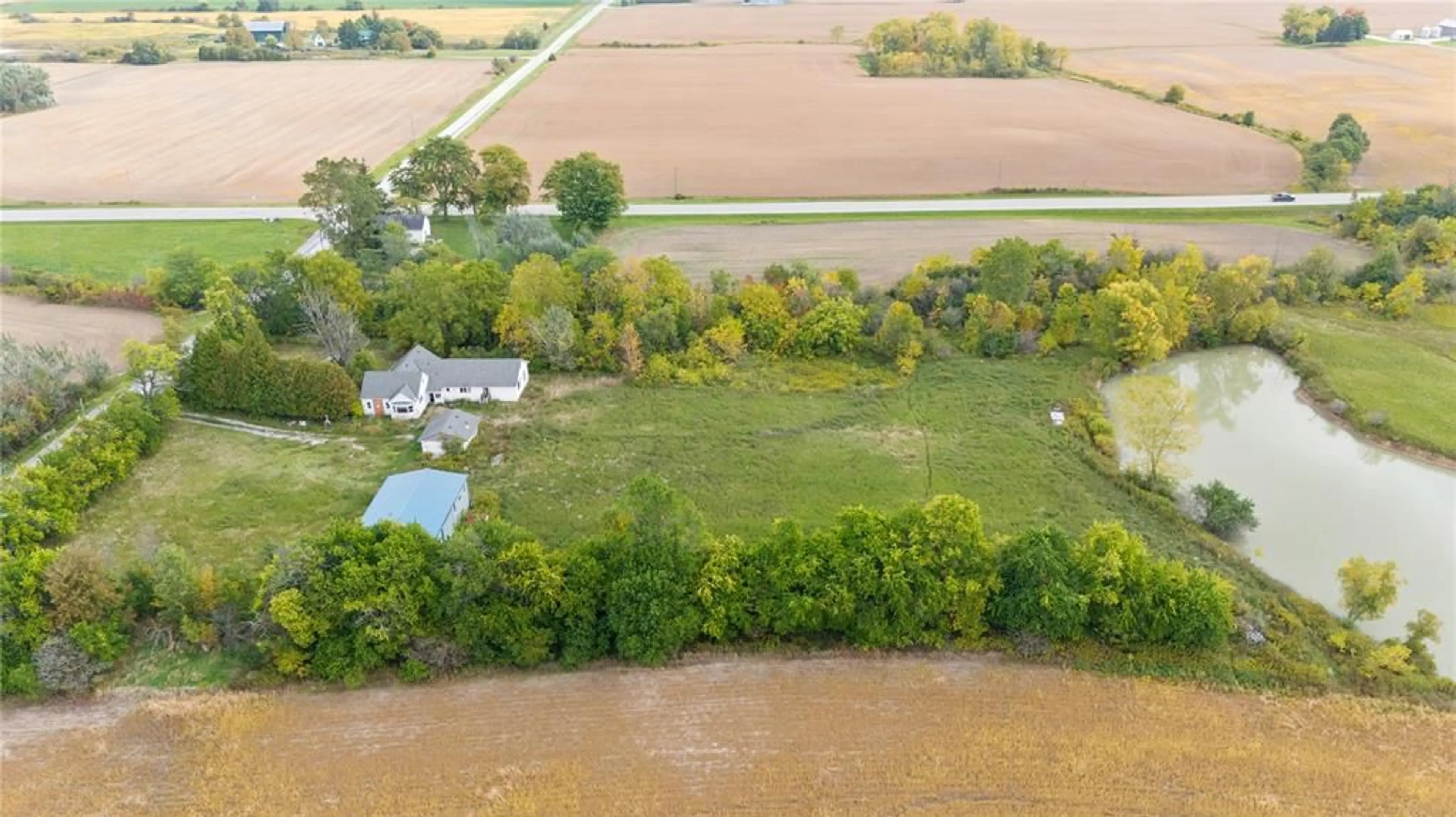 A pic from outside/outdoor area/front of a property/back of a property/a pic from drone, water/lake/river/ocean view for 2377 MOORE Line, St Clair Ontario N0M 1N0