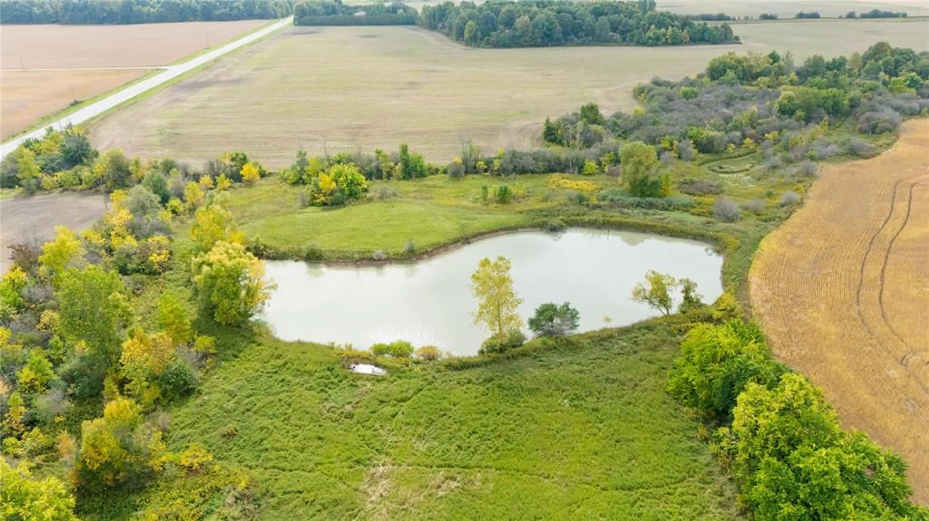 A pic from outside/outdoor area/front of a property/back of a property/a pic from drone, water/lake/river/ocean view for 2377 MOORE Line, St Clair Ontario N0M 1N0
