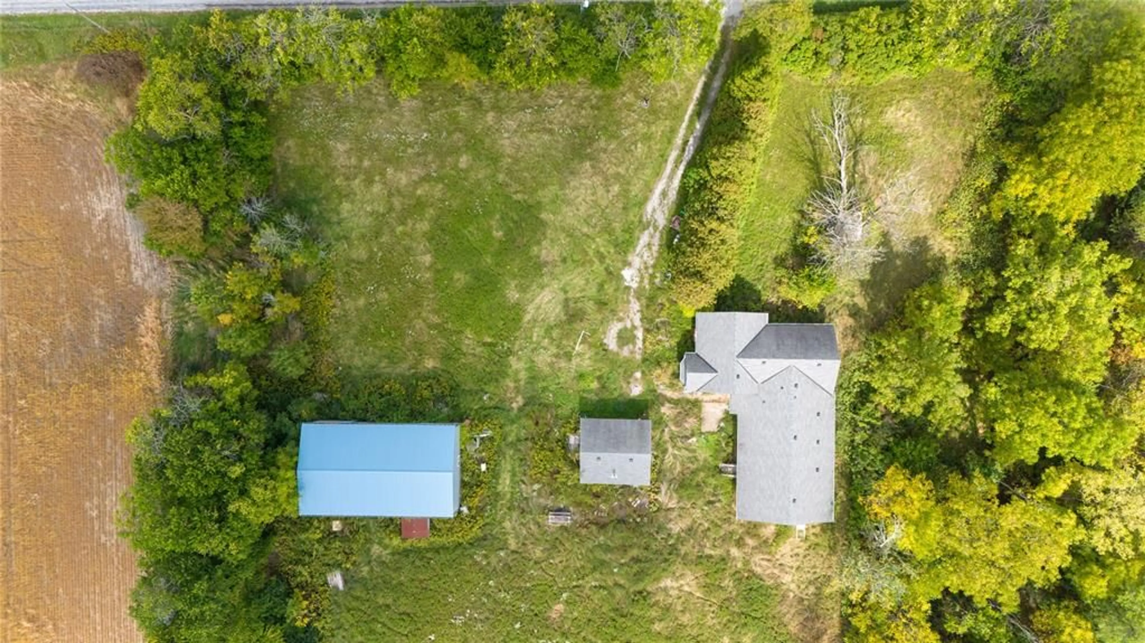 A pic from outside/outdoor area/front of a property/back of a property/a pic from drone, unknown for 2377 MOORE Line, St Clair Ontario N0M 1N0