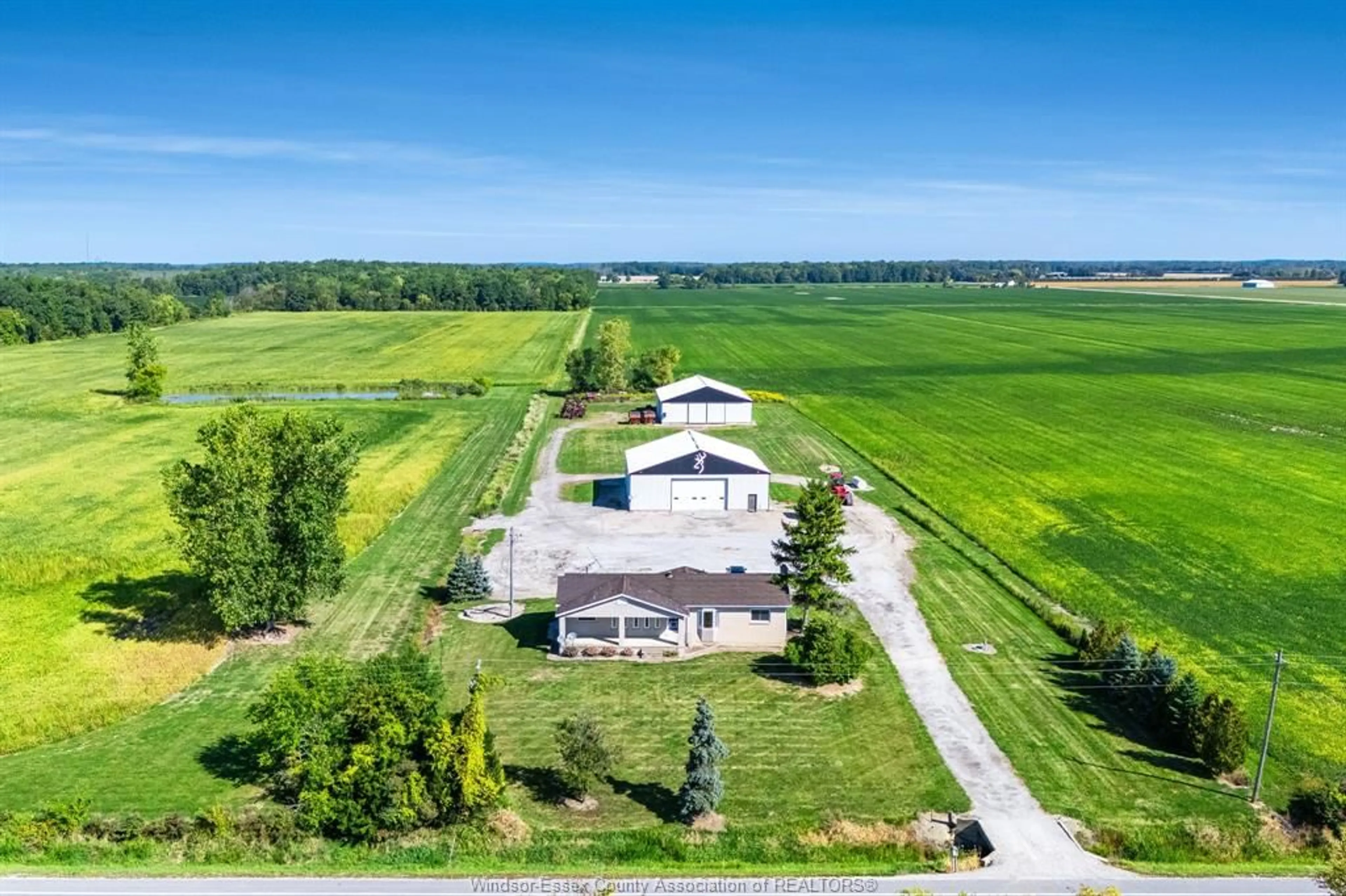 A pic from outside/outdoor area/front of a property/back of a property/a pic from drone, water/lake/river/ocean view for 7458 County Rd 18, Harrow Ontario N0R 1G0