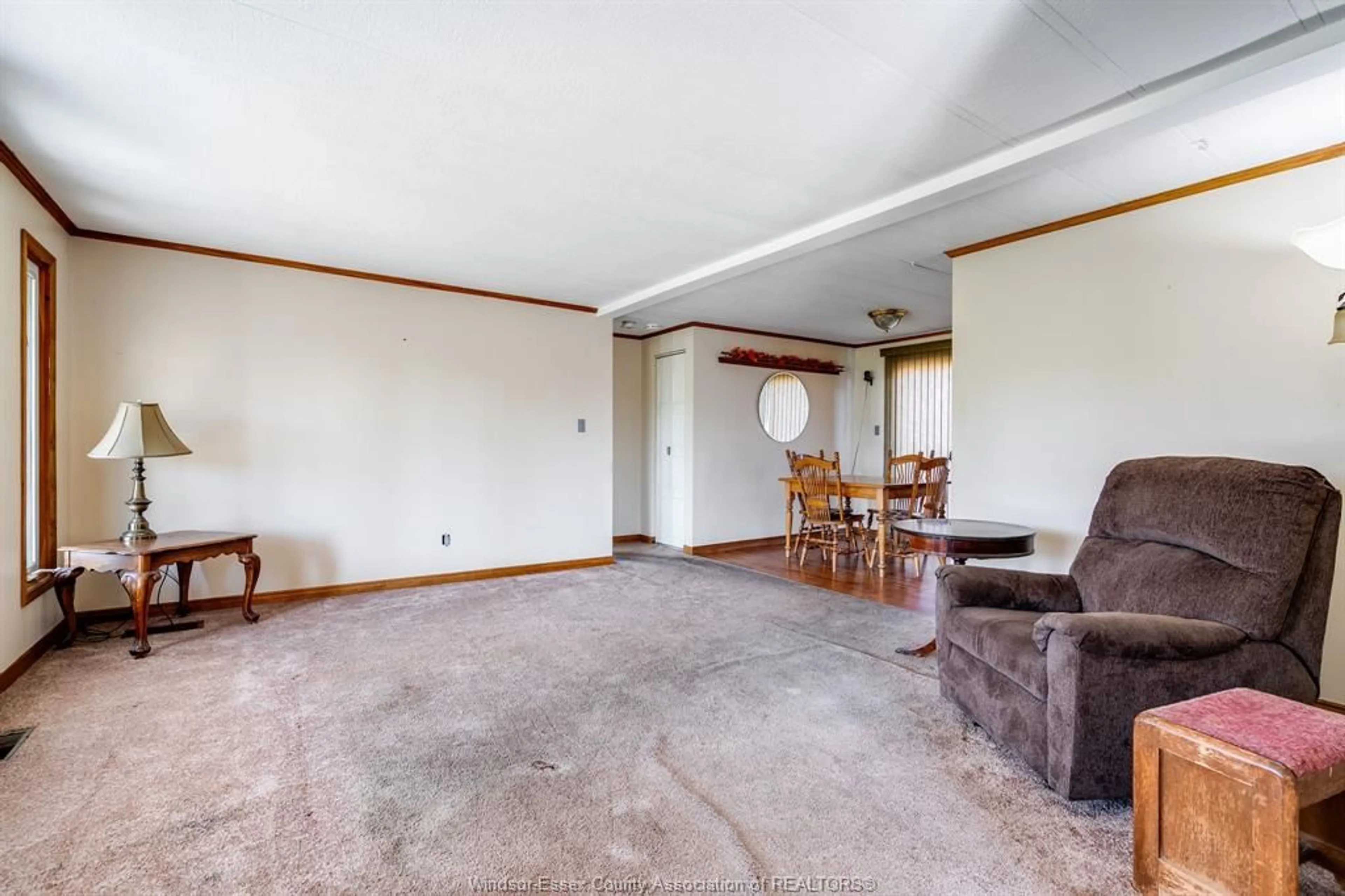Living room with furniture, unknown for 7458 County Rd 18, Harrow Ontario N0R 1G0