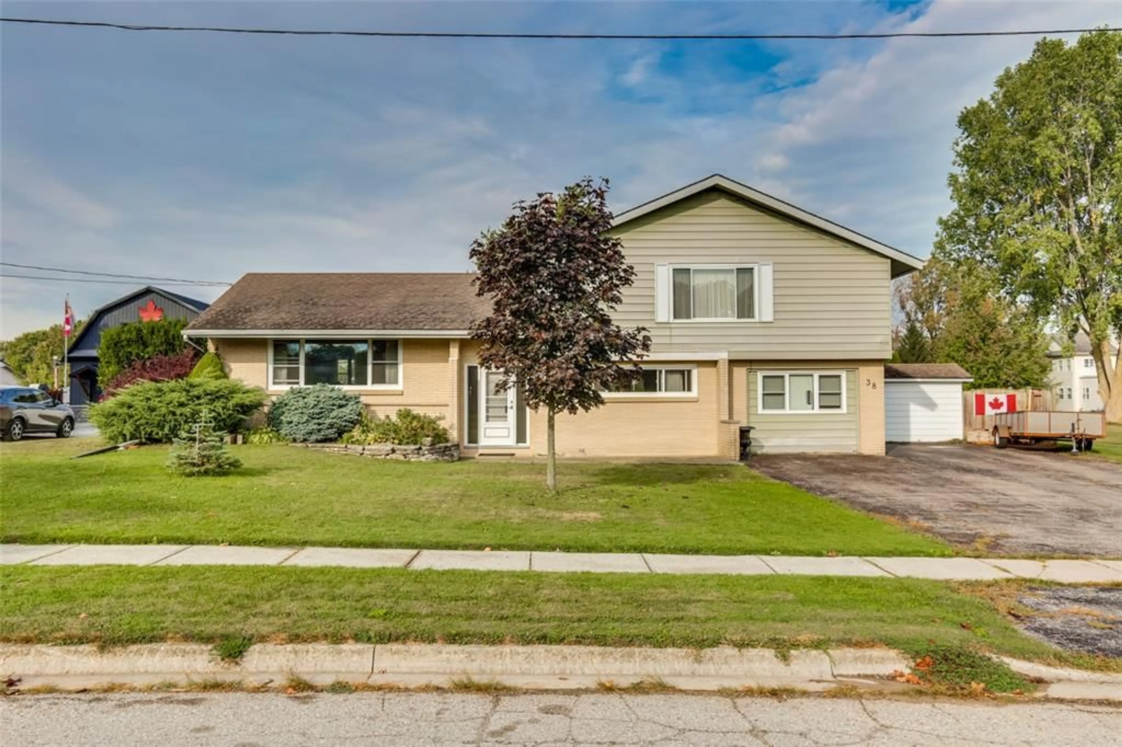 Home with vinyl exterior material, street for 38 WARWICK St, Warwick-Watford Ontario N0M 2S0